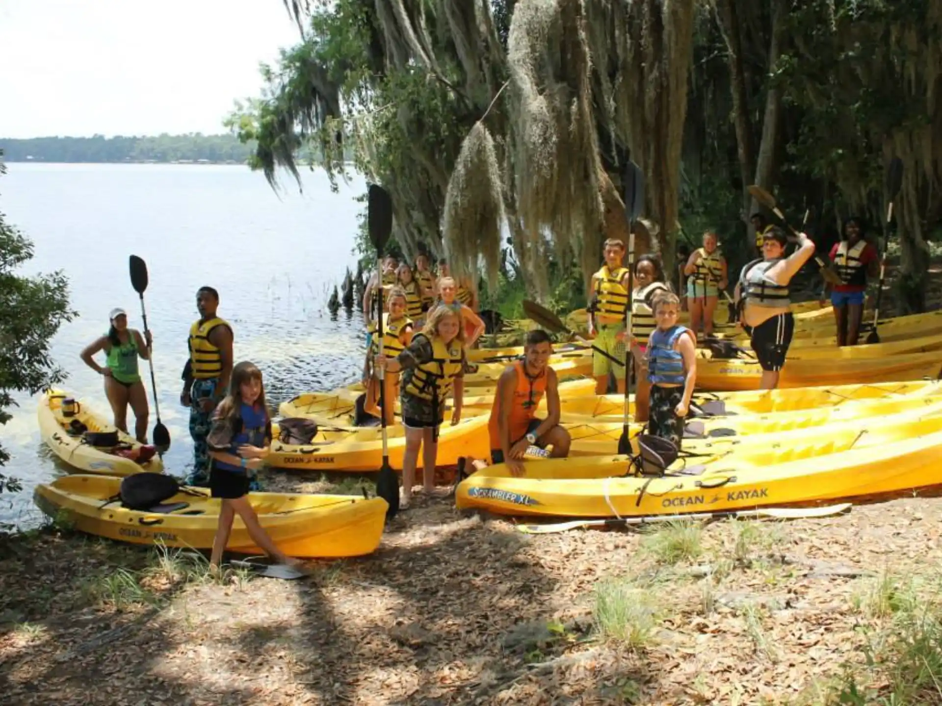 a group of people in kayaks