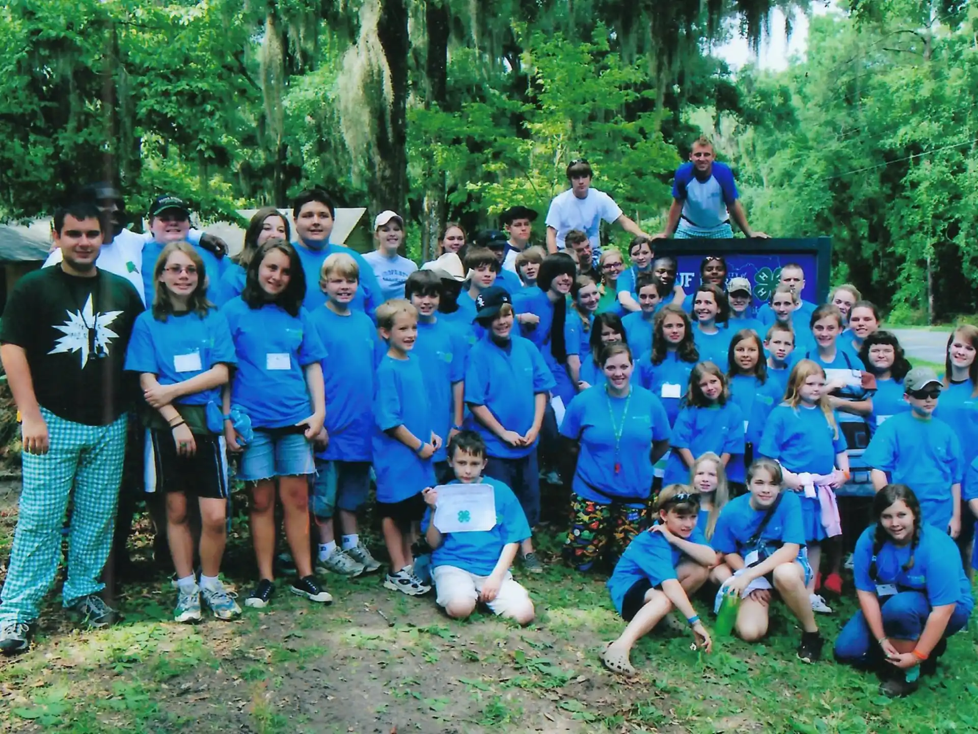 a group of people posing for a photo