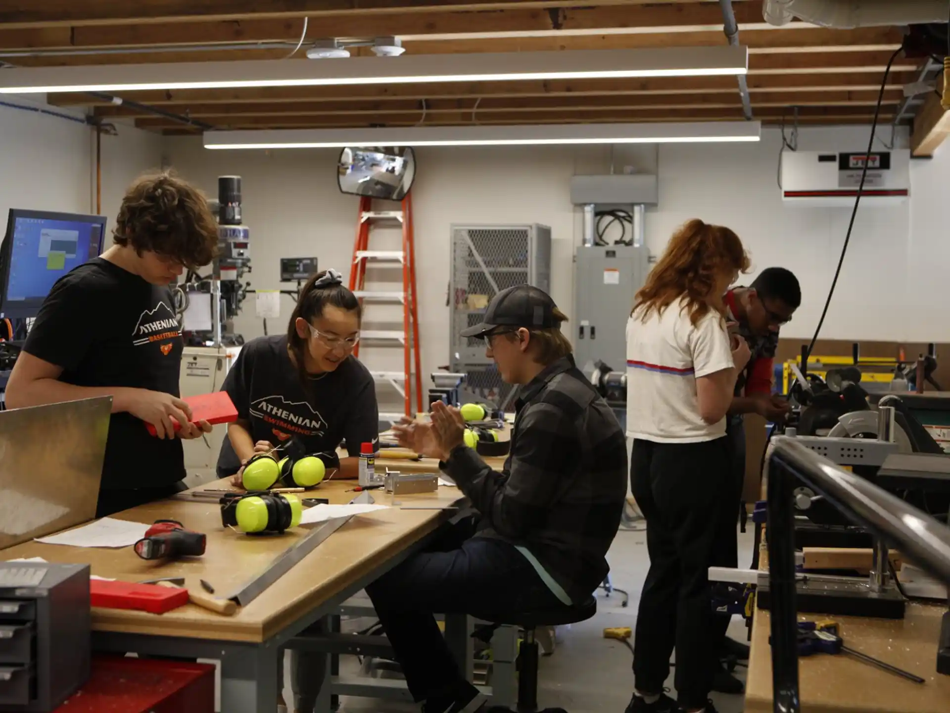 a group of people working in a room