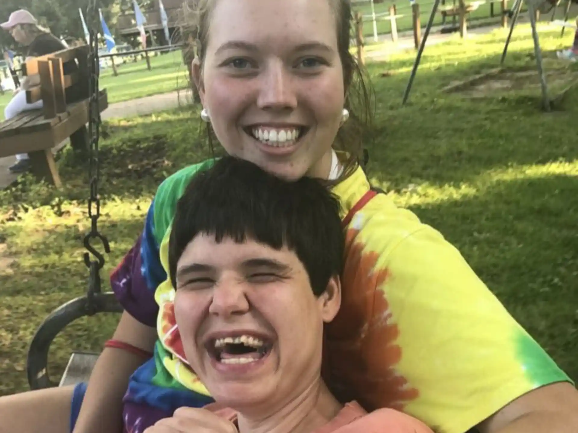 a person and a child smiling