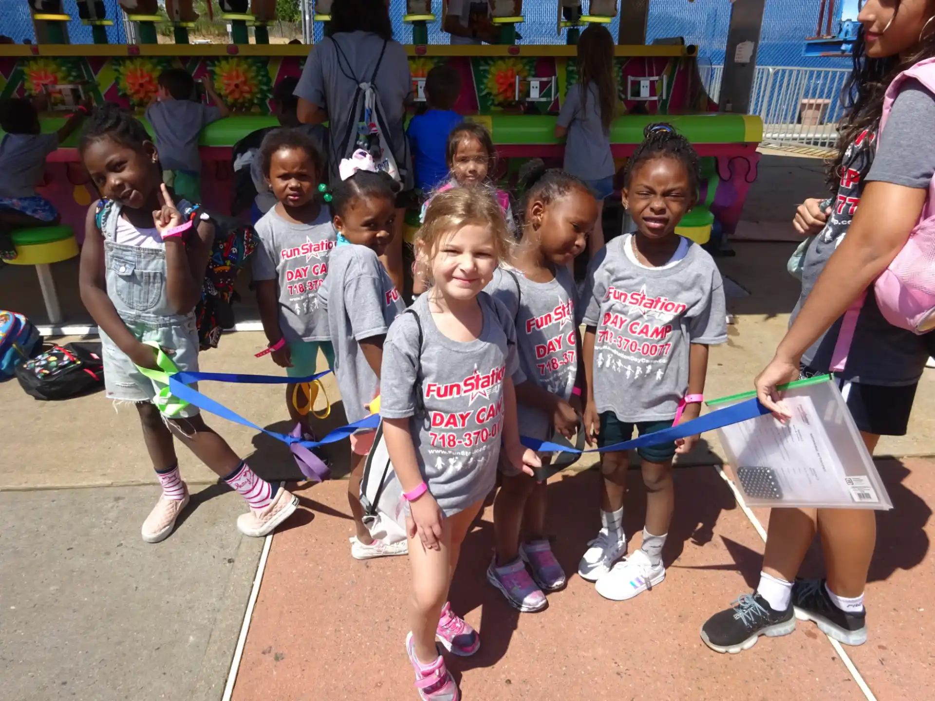 a group of children in matching t-shirts