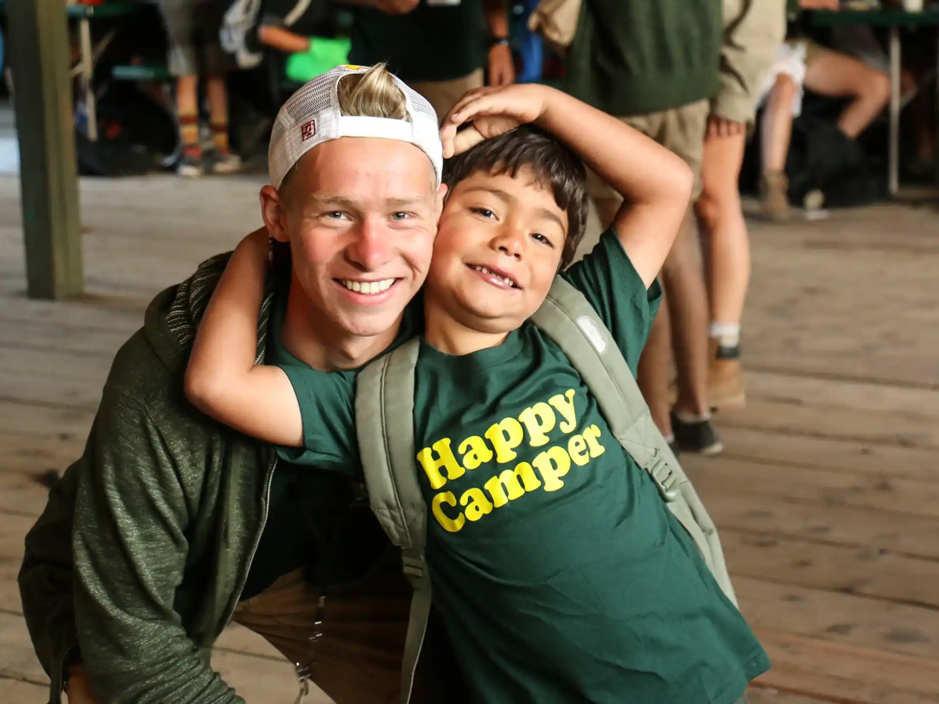 a person and a boy posing for a picture