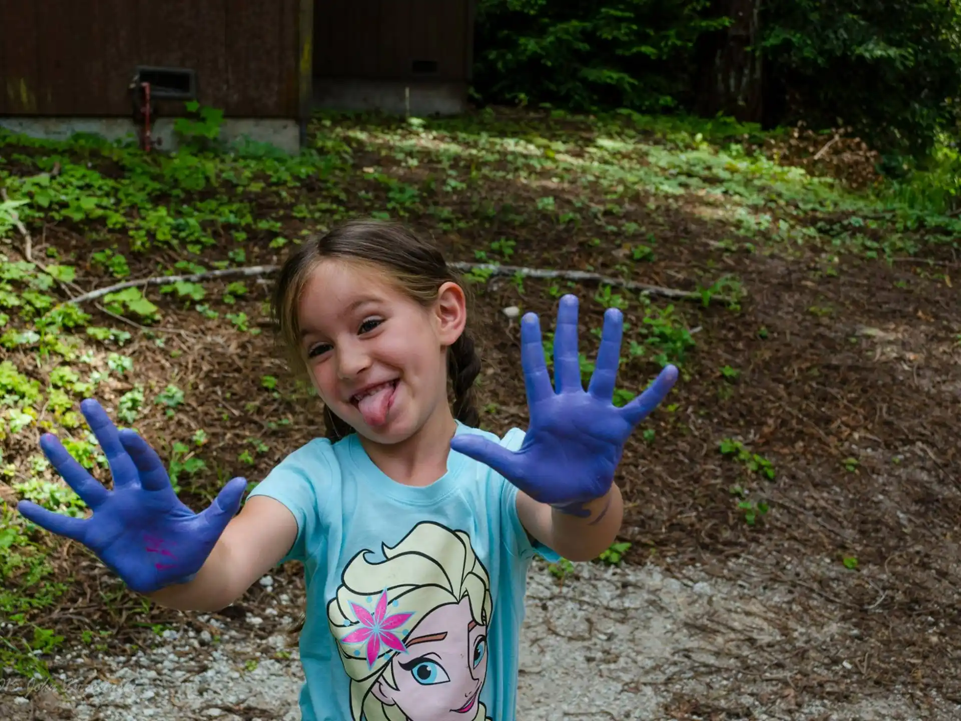 a girl with her hands up