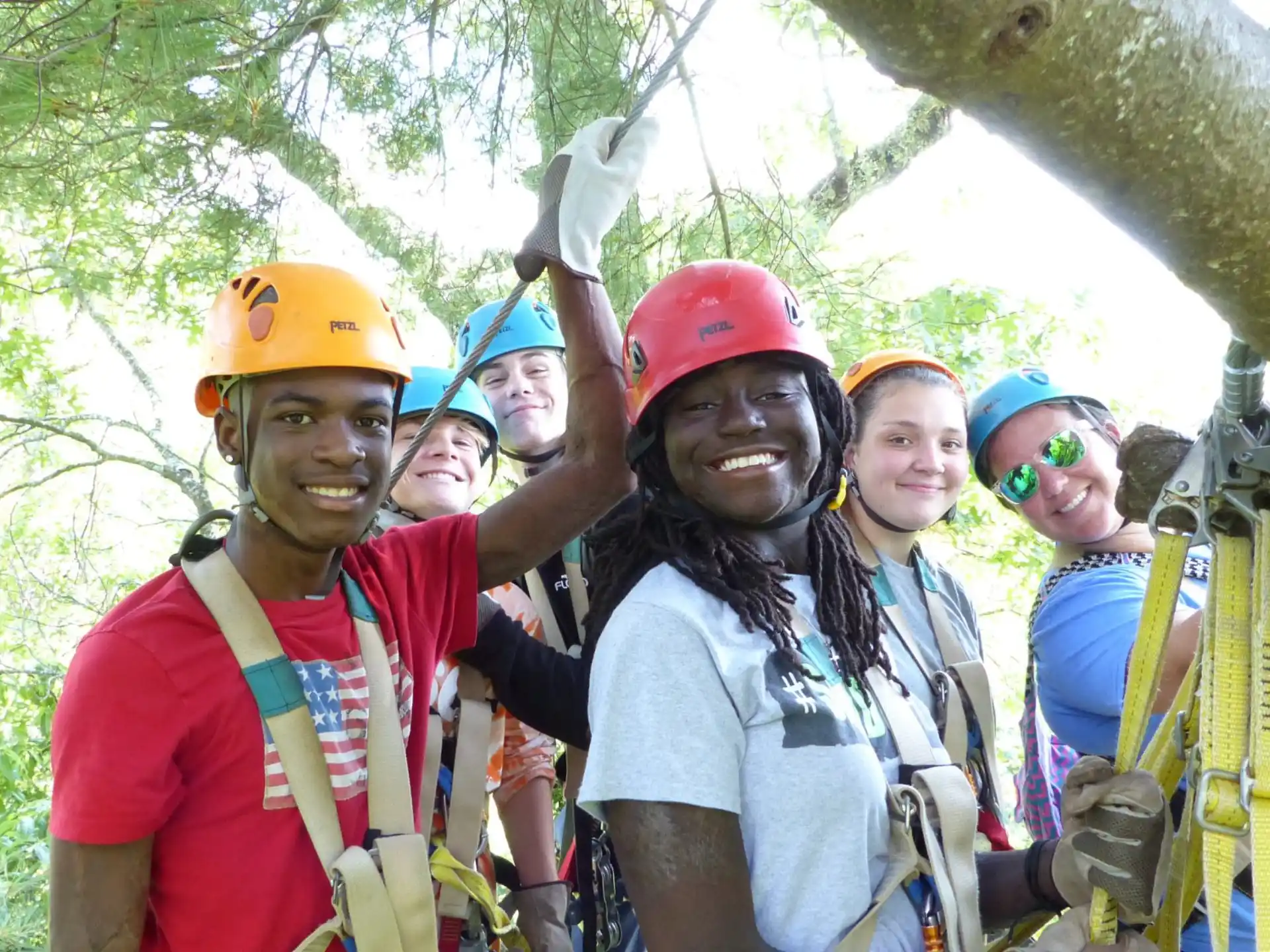 a group of people wearing helmets