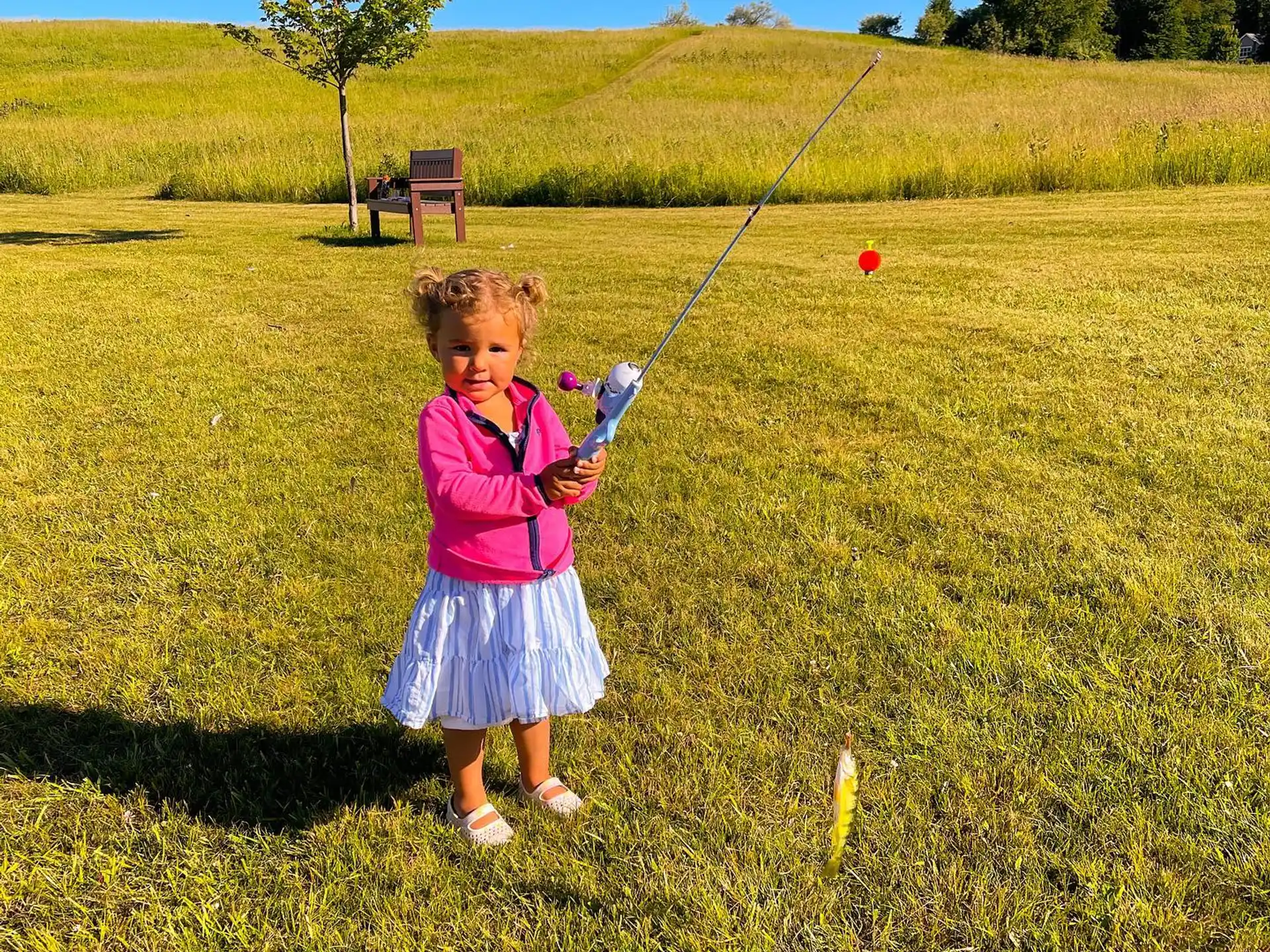 a girl holding a bow and arrow