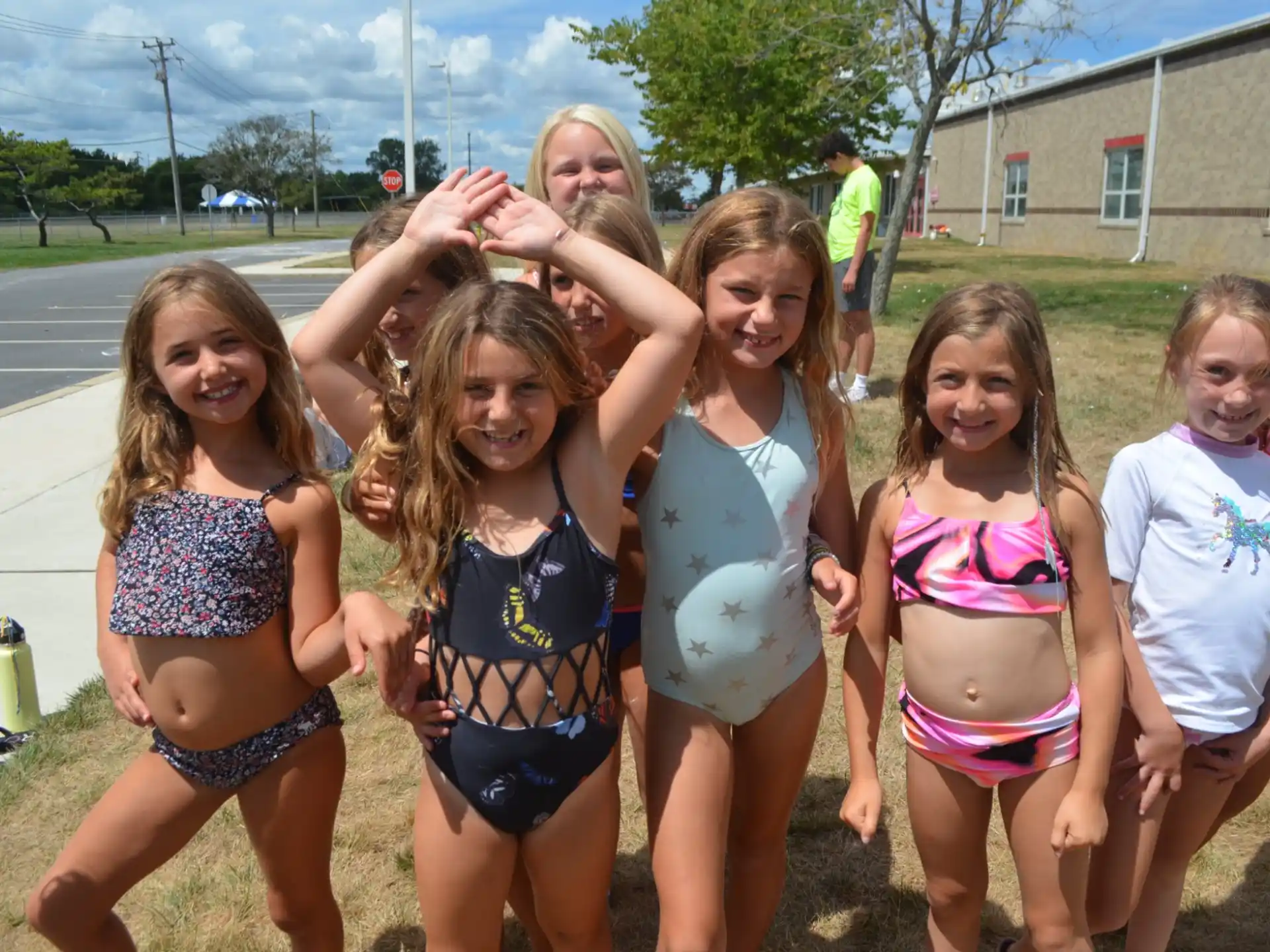 a group of girls posing for a picture