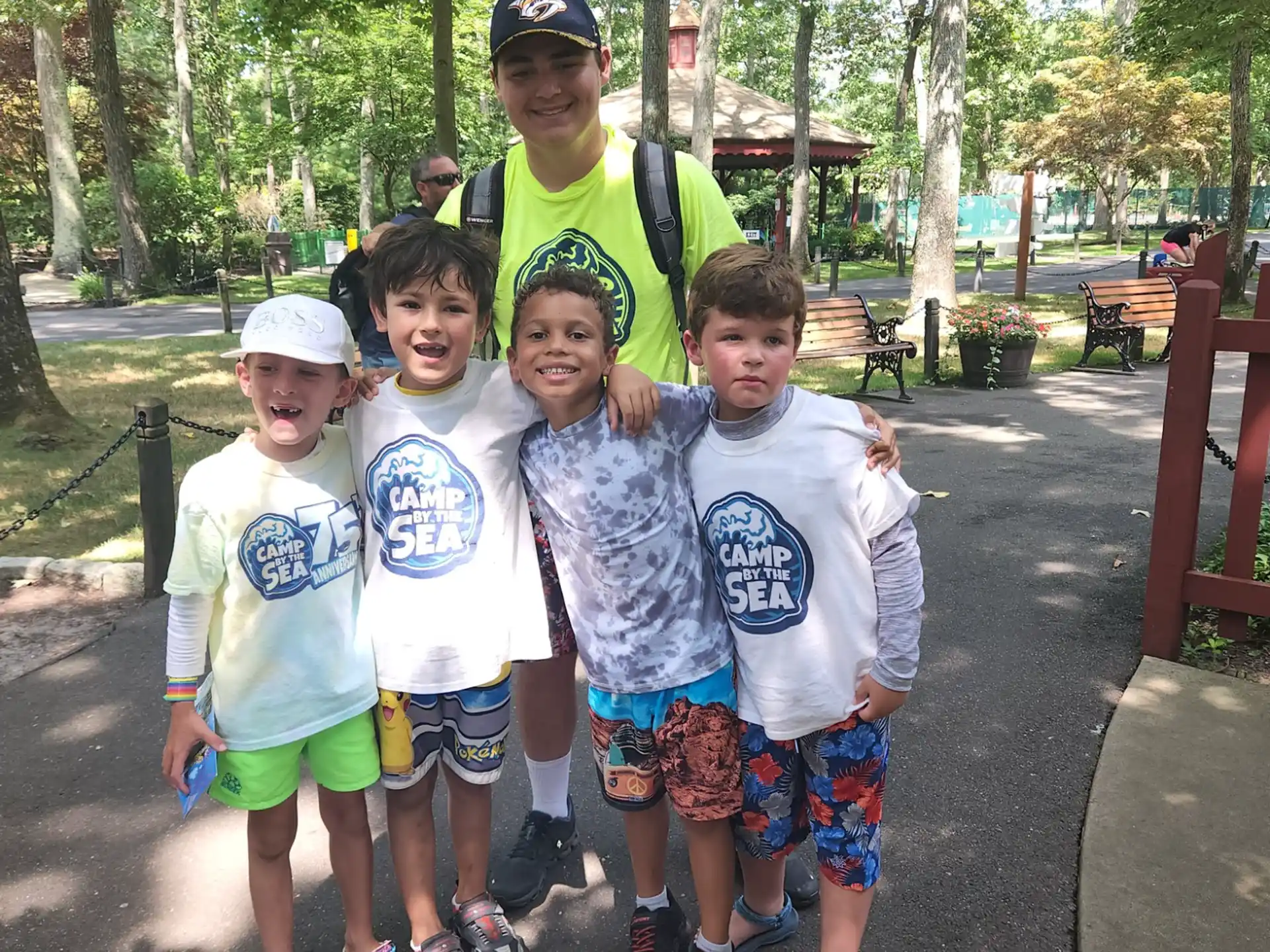 a group of kids posing for a photo