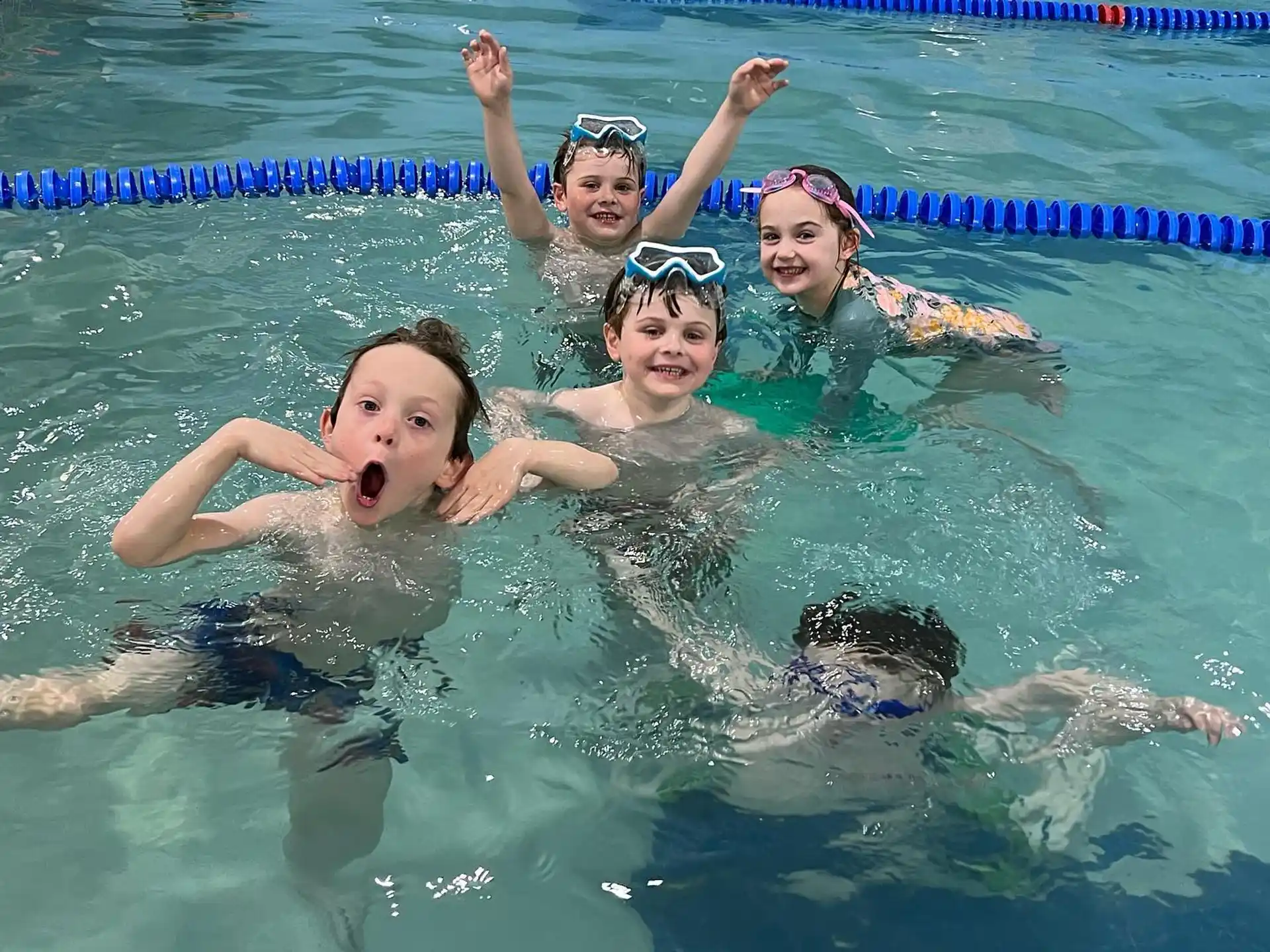 a group of people in a pool