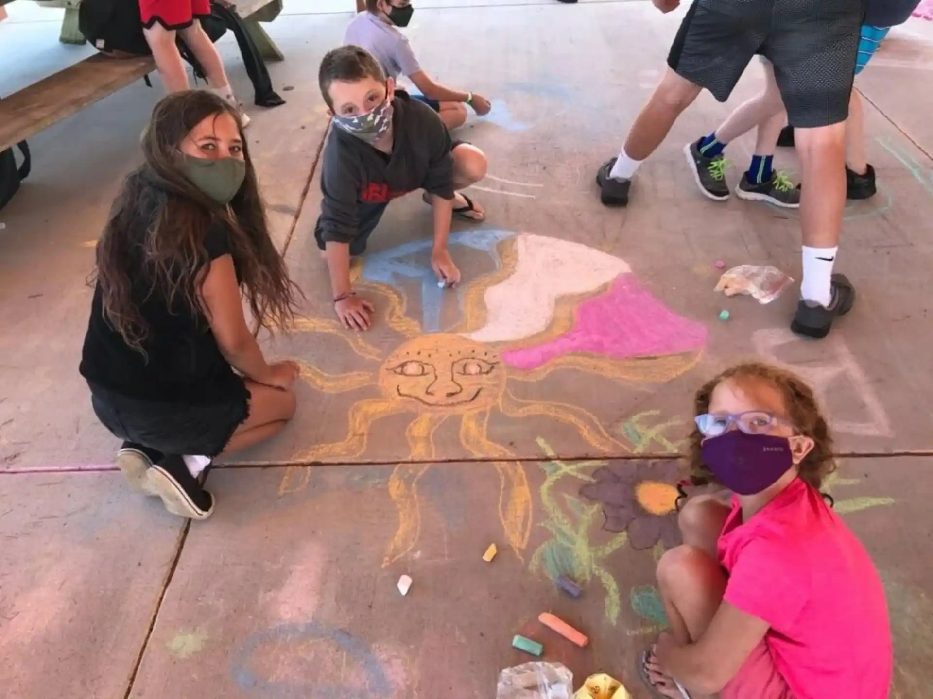 a group of people sitting on the floor