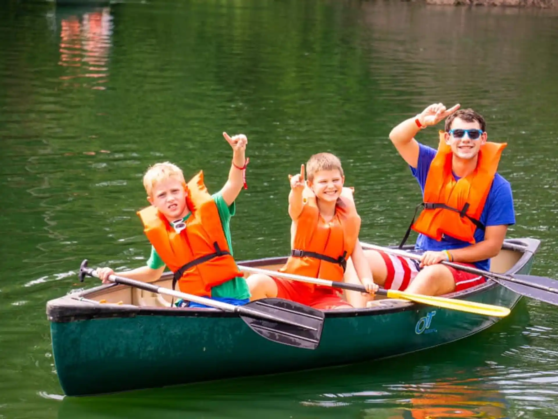 a group of people in a canoe