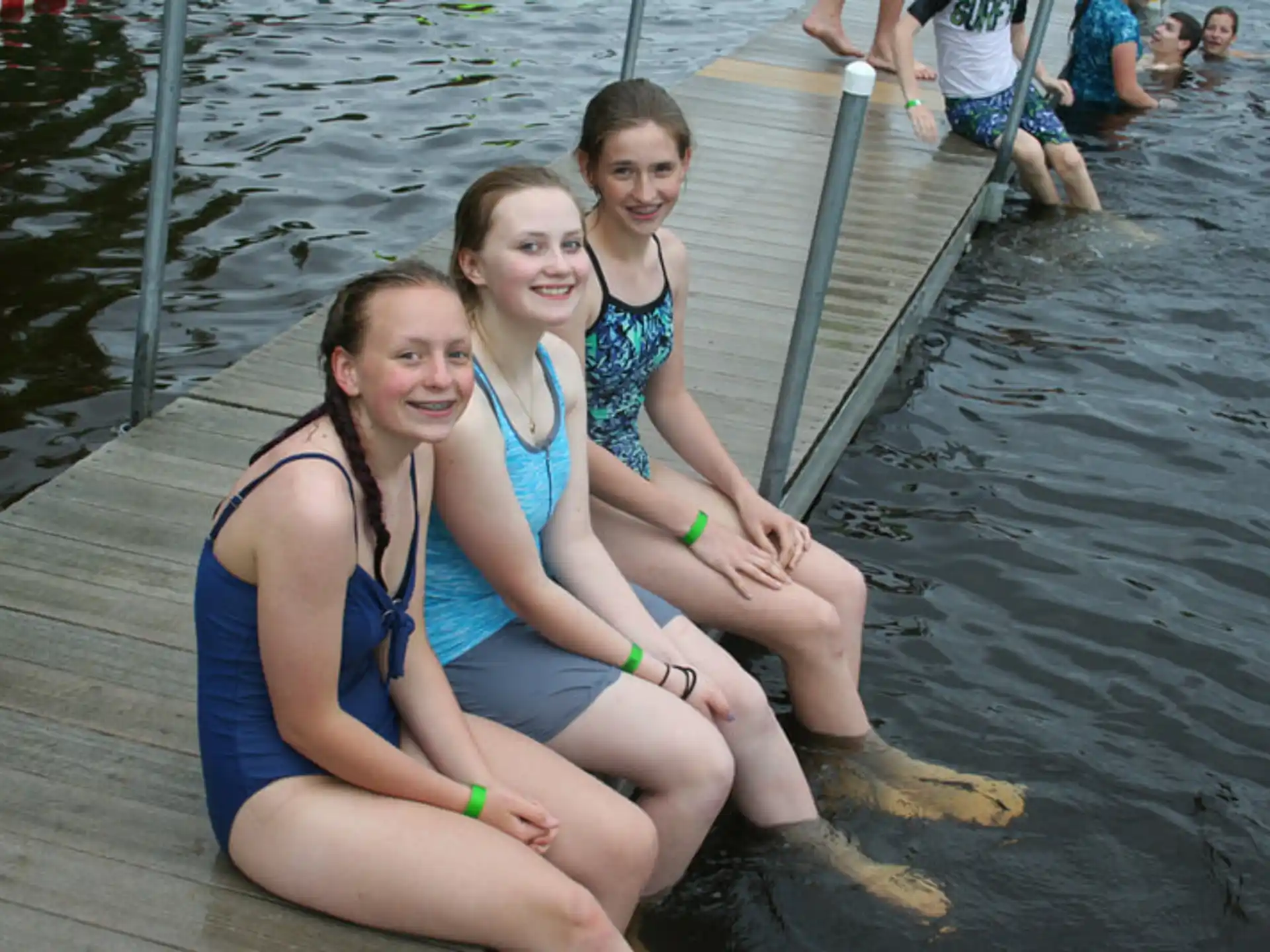 a group of women sitting on a boat