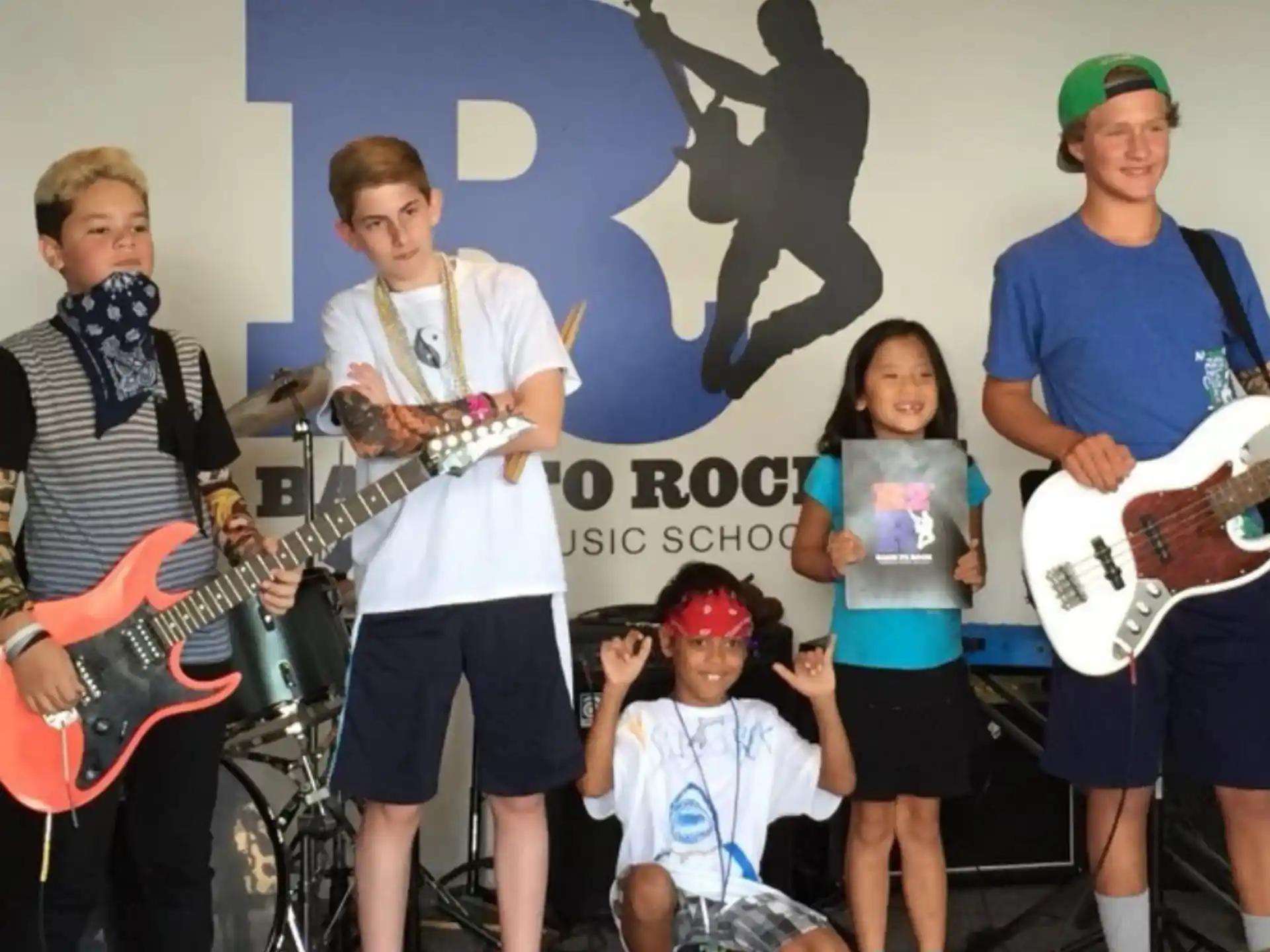 a group of people holding instruments
