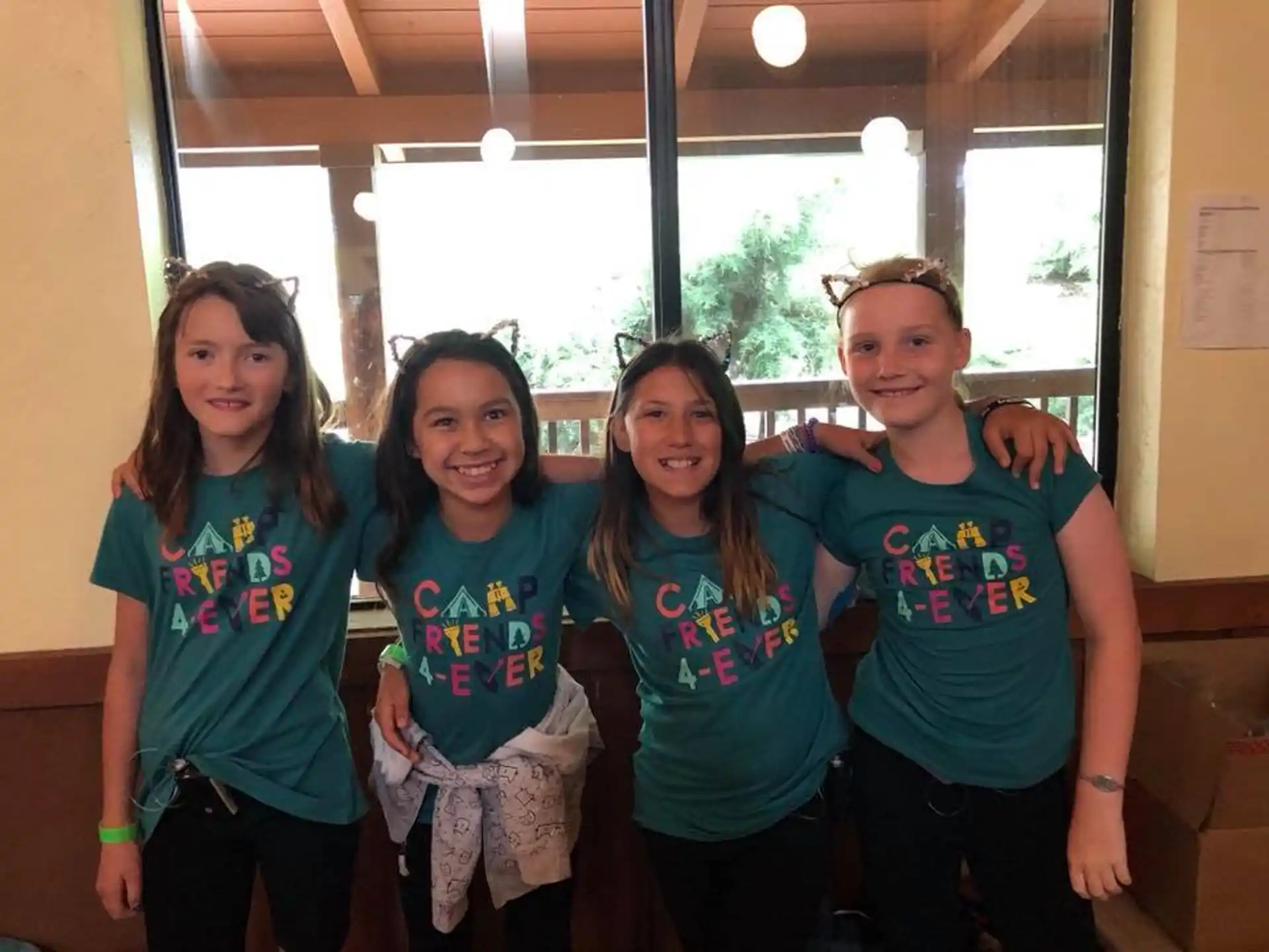 a group of girls posing for a photo