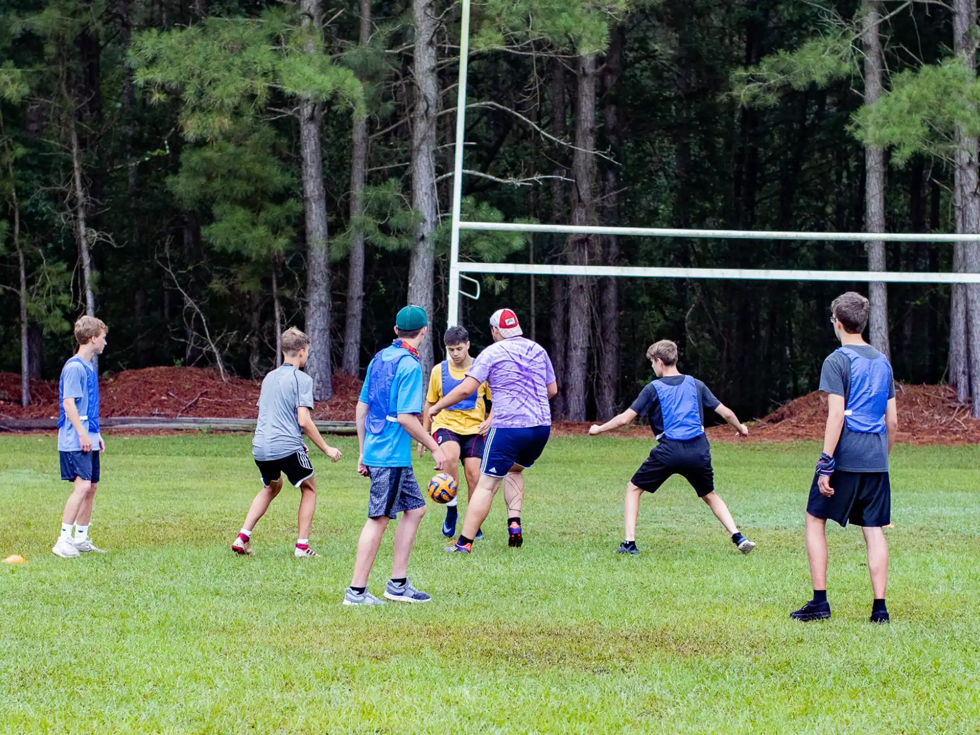 a group of people playing football