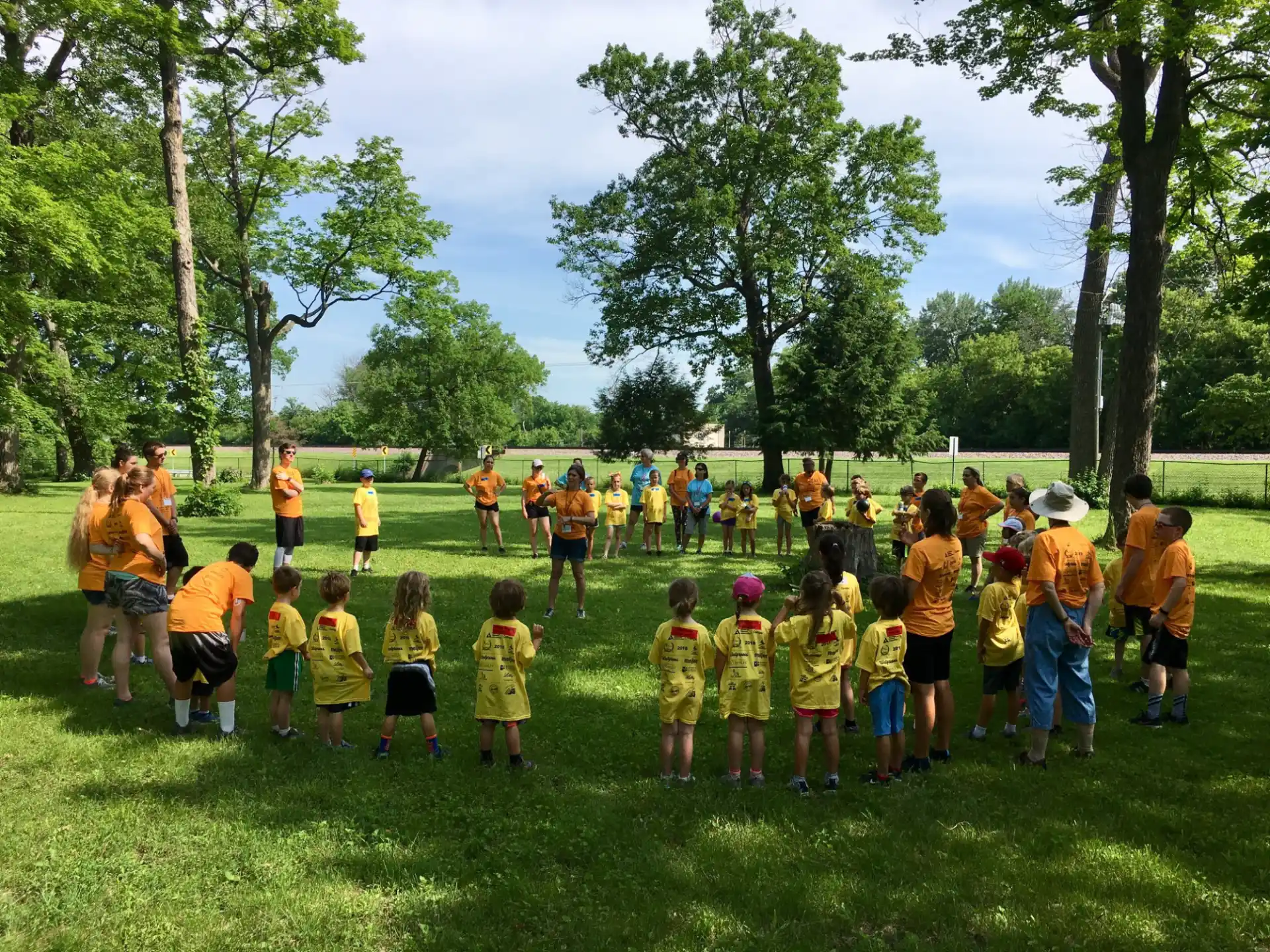 a group of children in a field