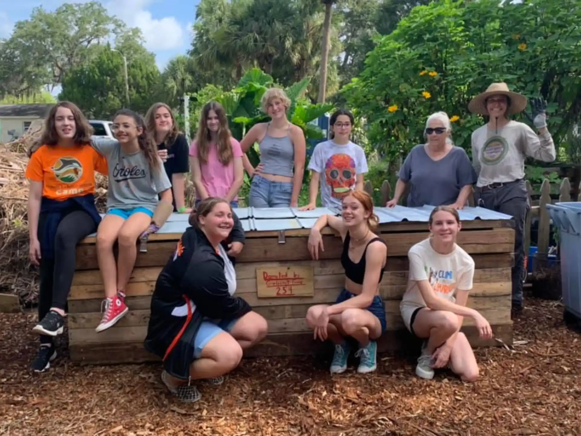 a group of people sitting on a bench