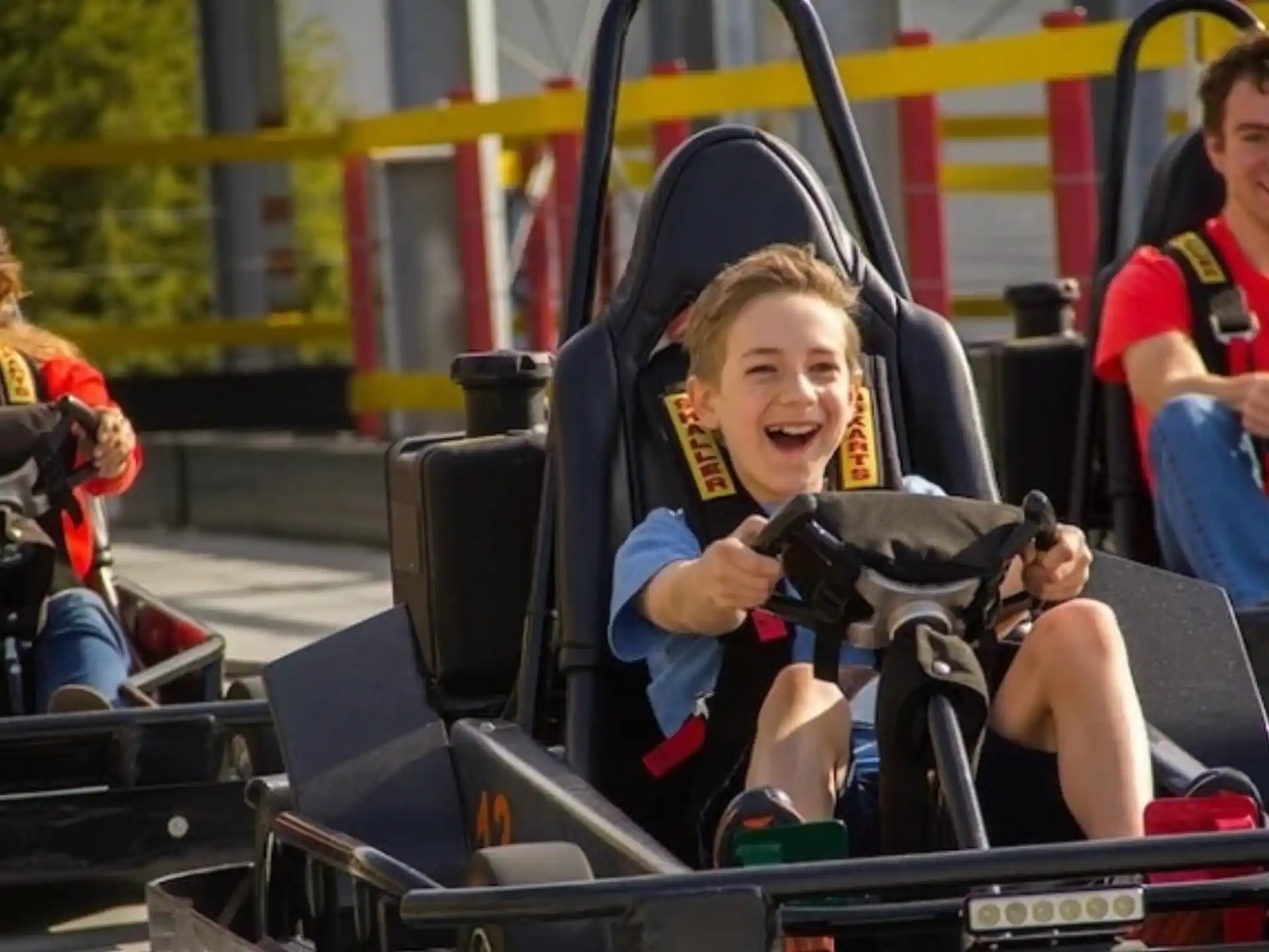 a group of kids on a roller coaster