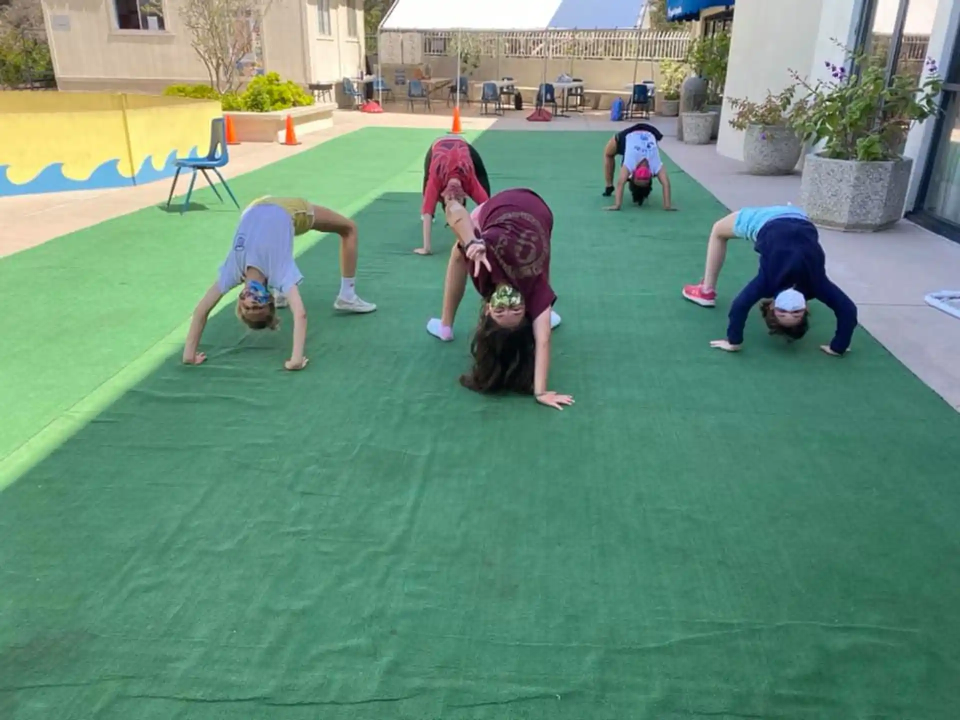 a group of people kneeling on the ground