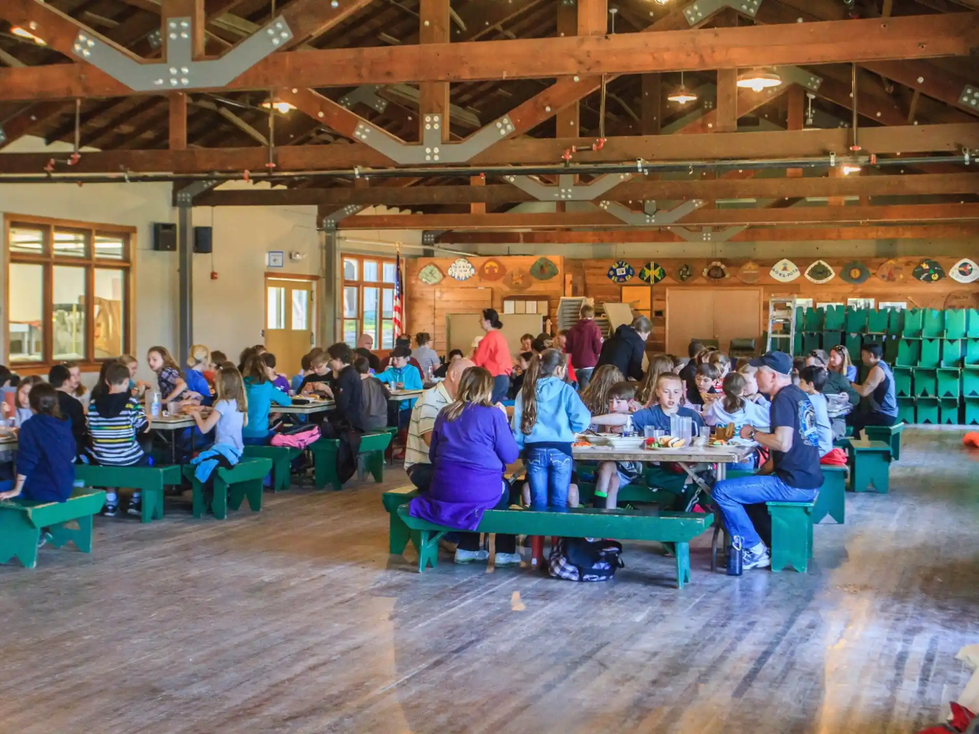 a group of people sitting at tables