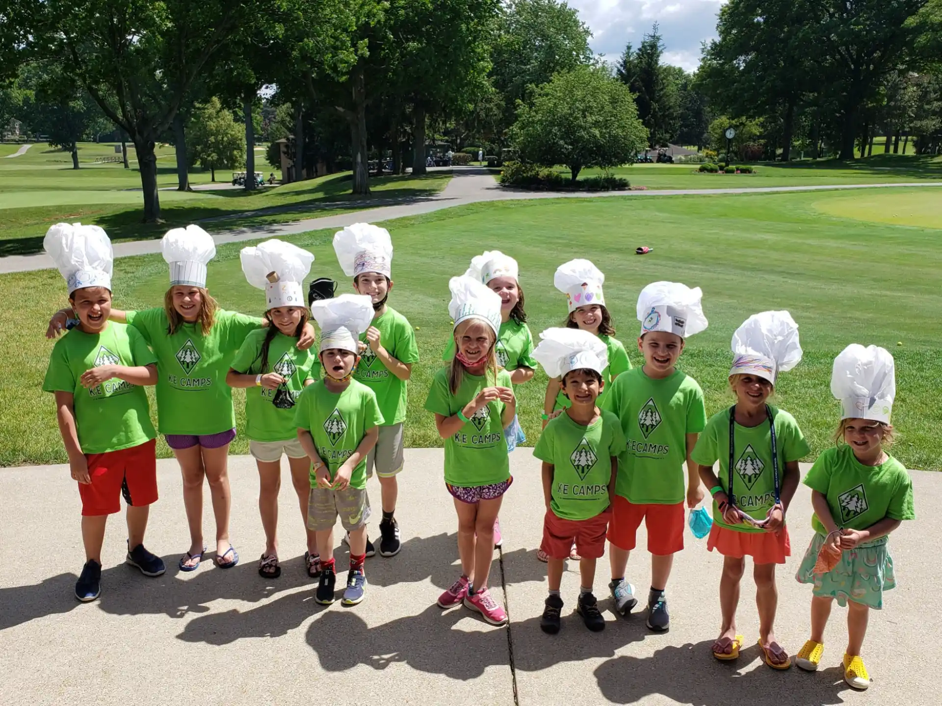 a group of children wearing matching outfits