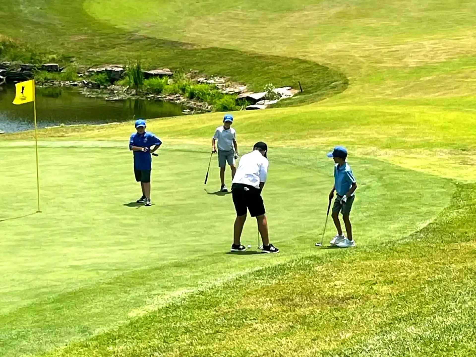 a group of people playing golf