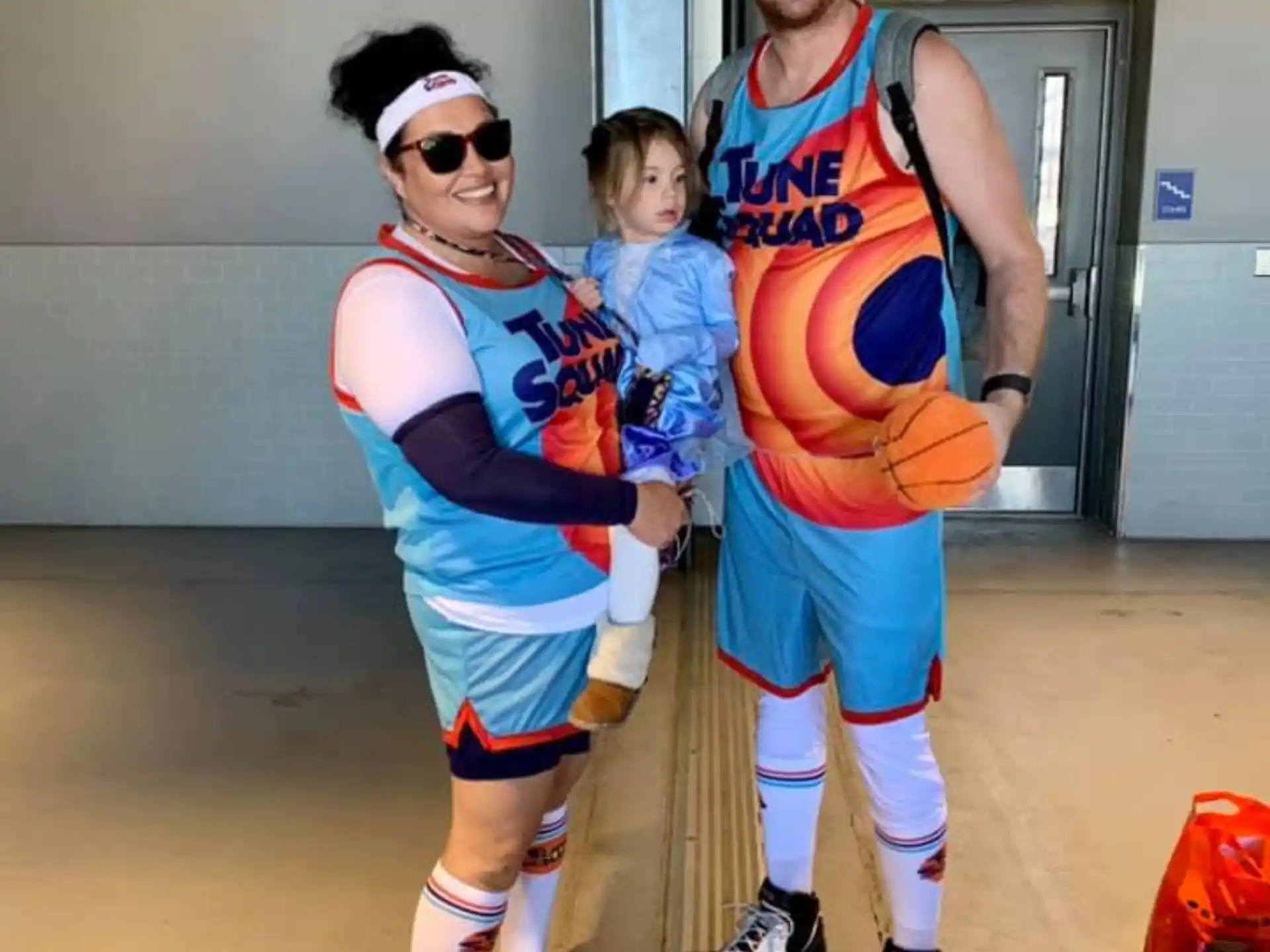a man and woman in sports uniforms