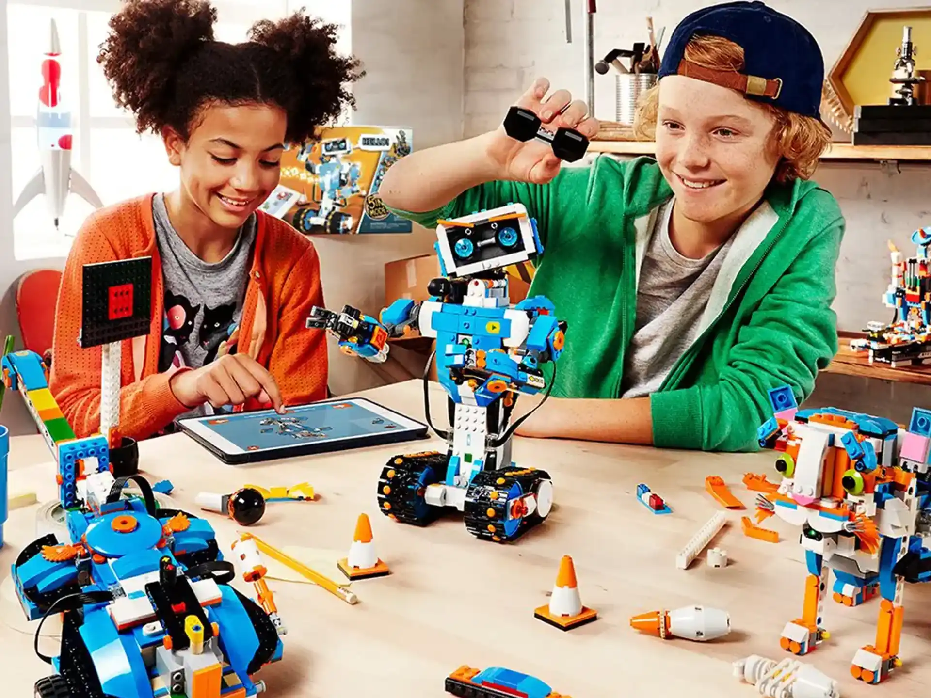 a couple of people working on a robot