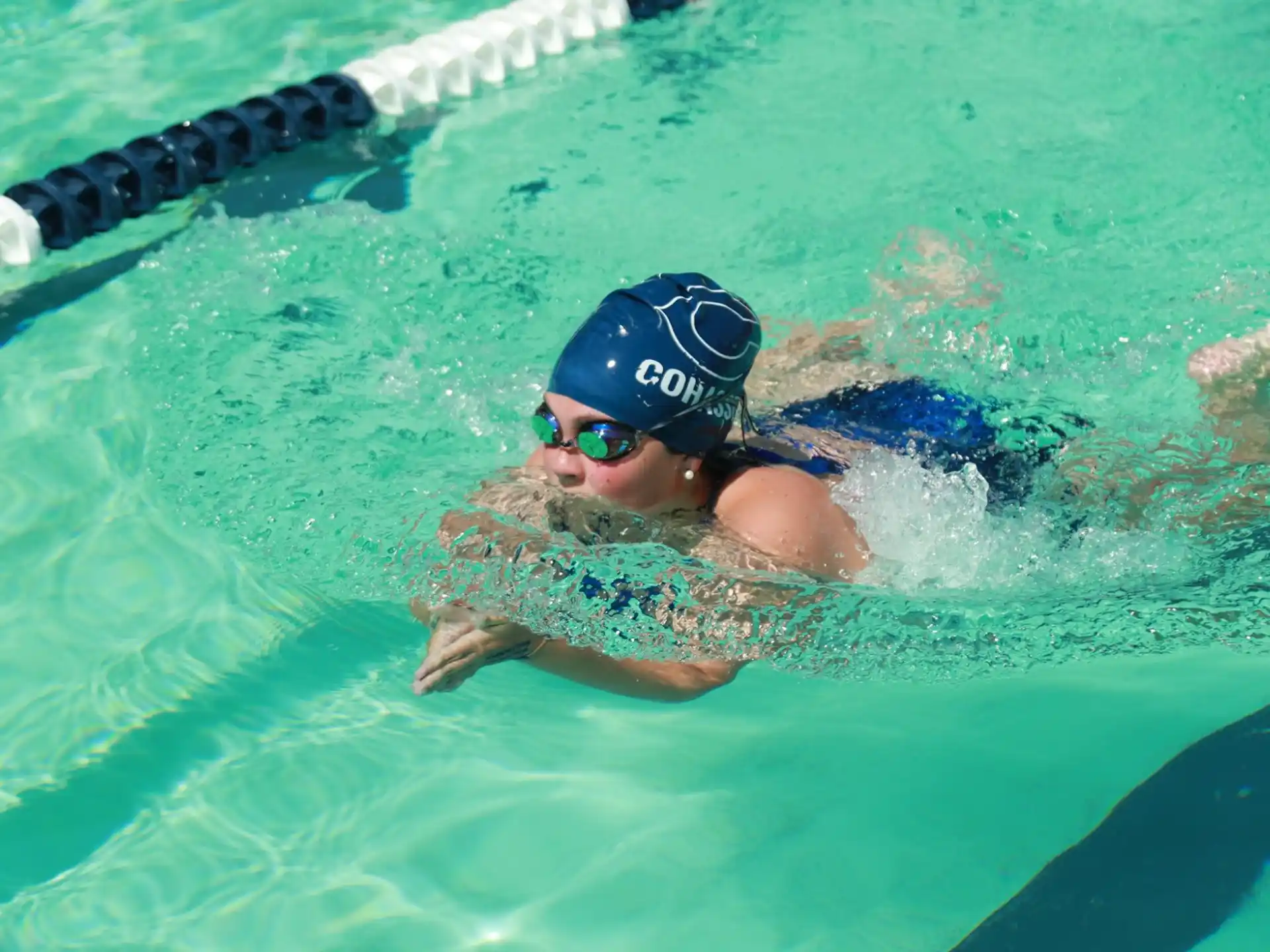 a person swimming in a pool