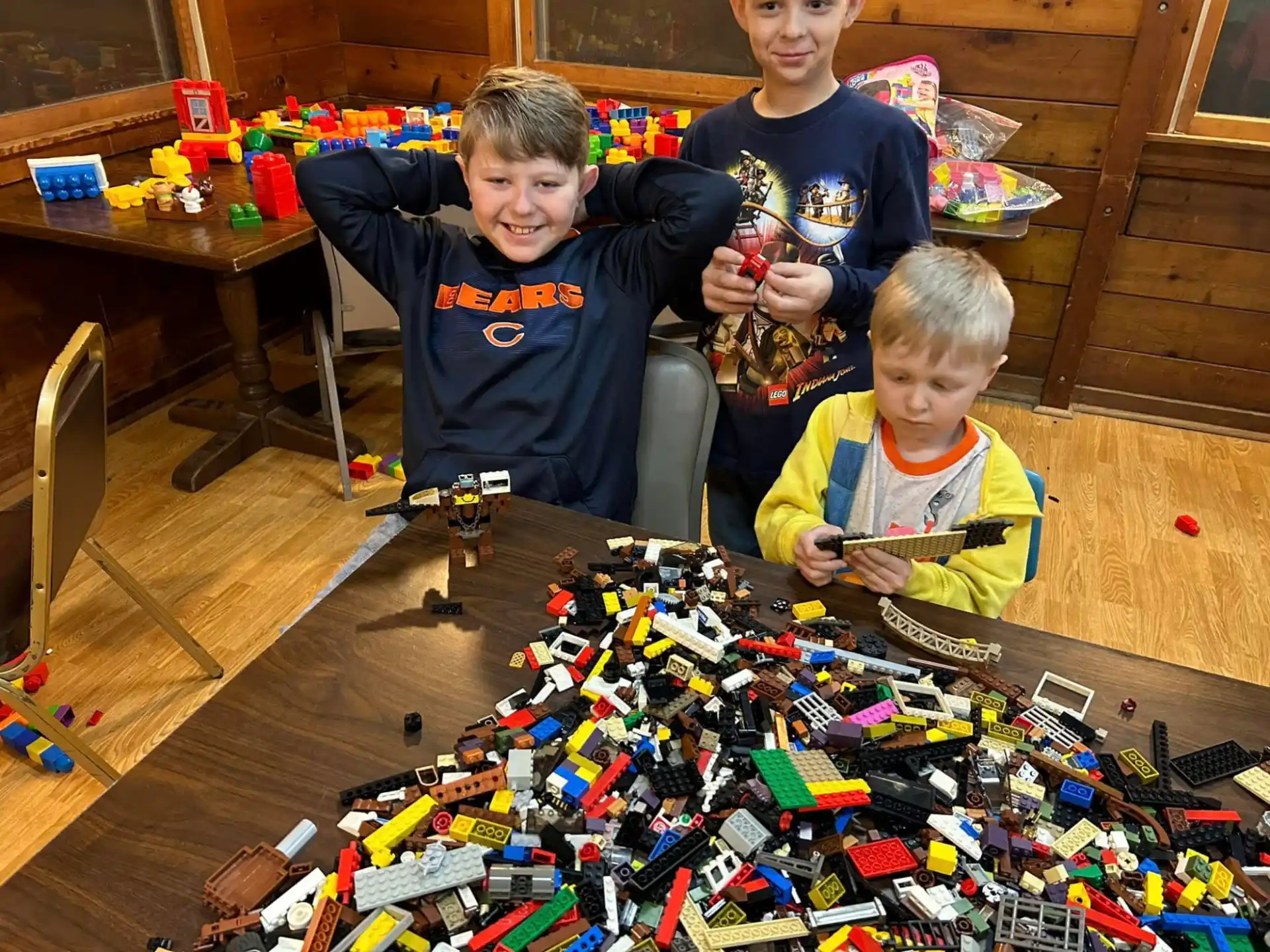 a group of boys playing with toys