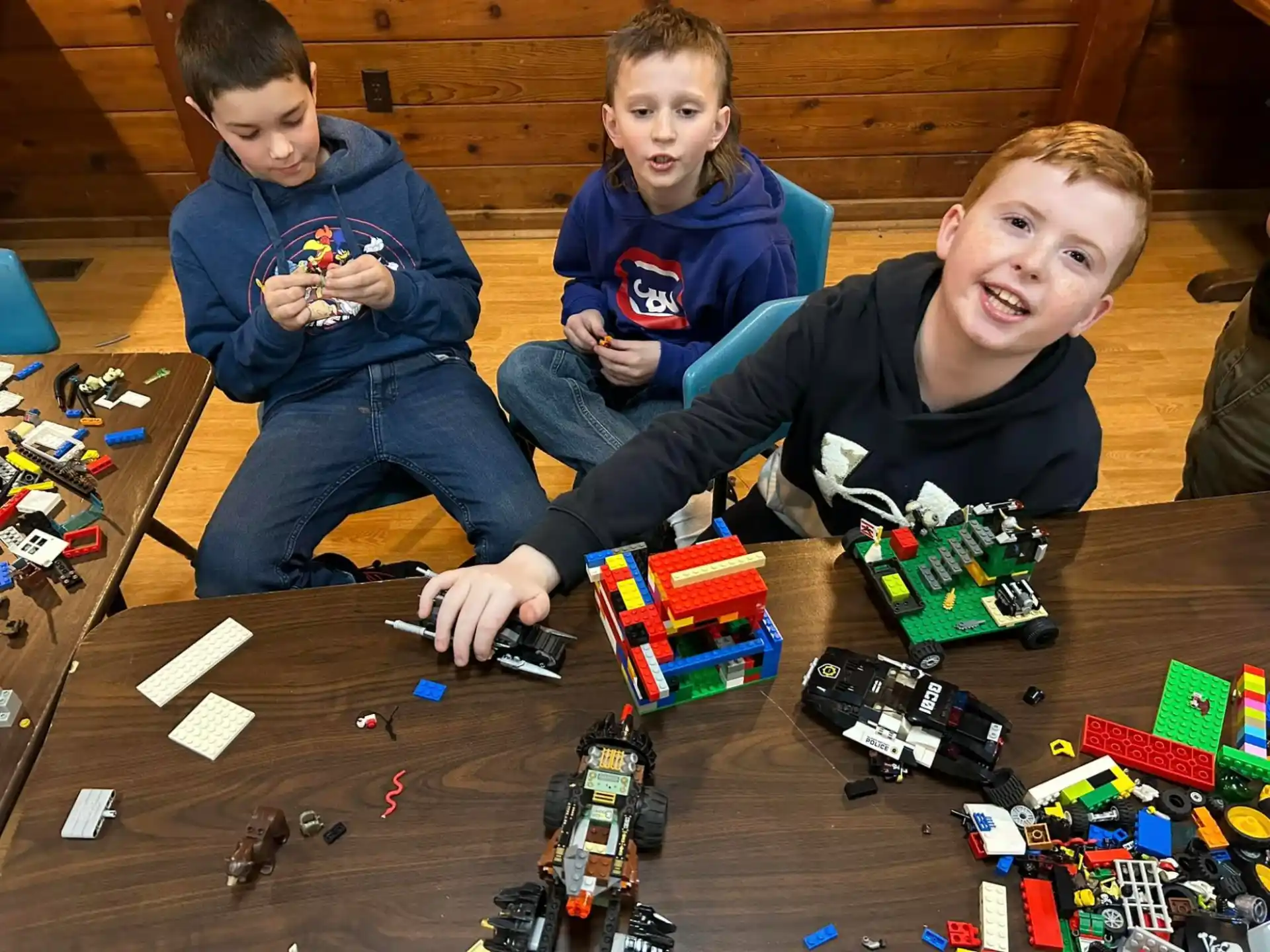 a group of boys playing with toys