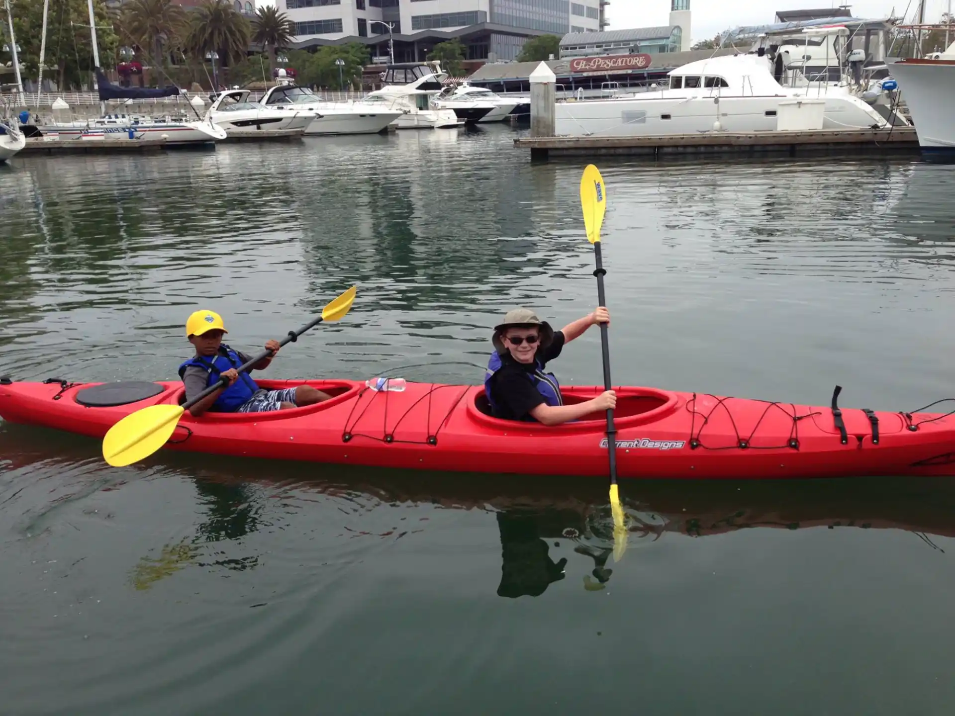 a couple of people in a canoe
