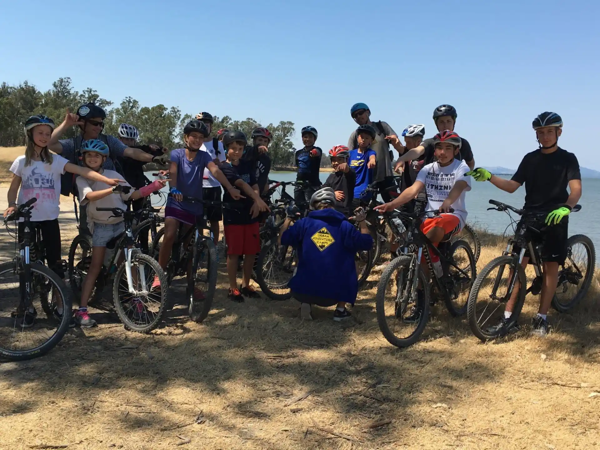 a group of people with bicycles