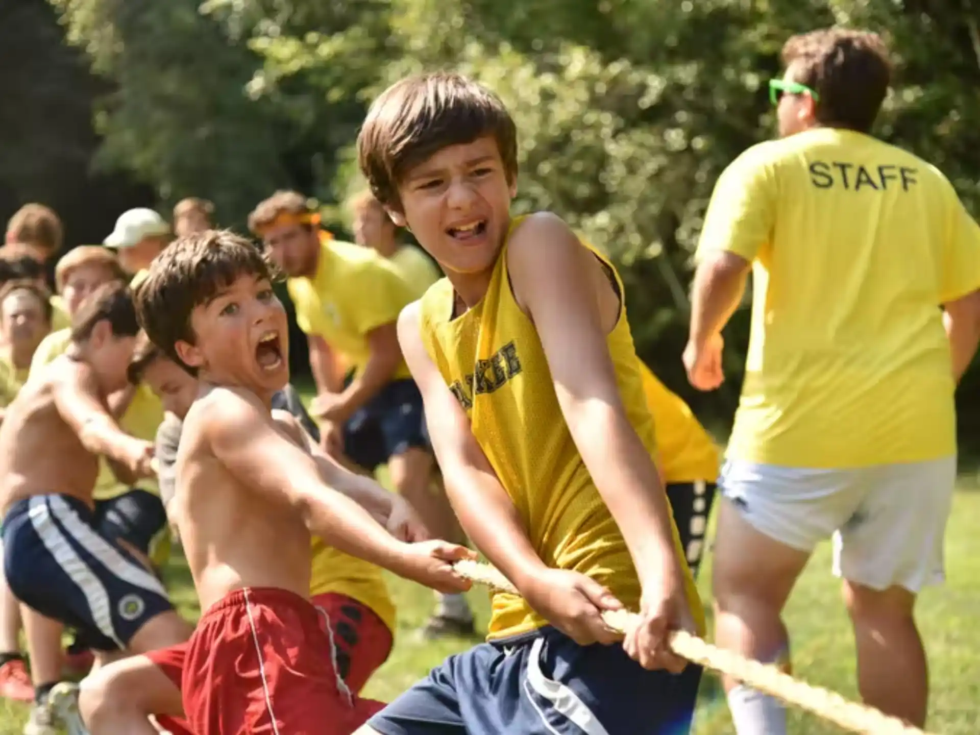 a group of boys playing football