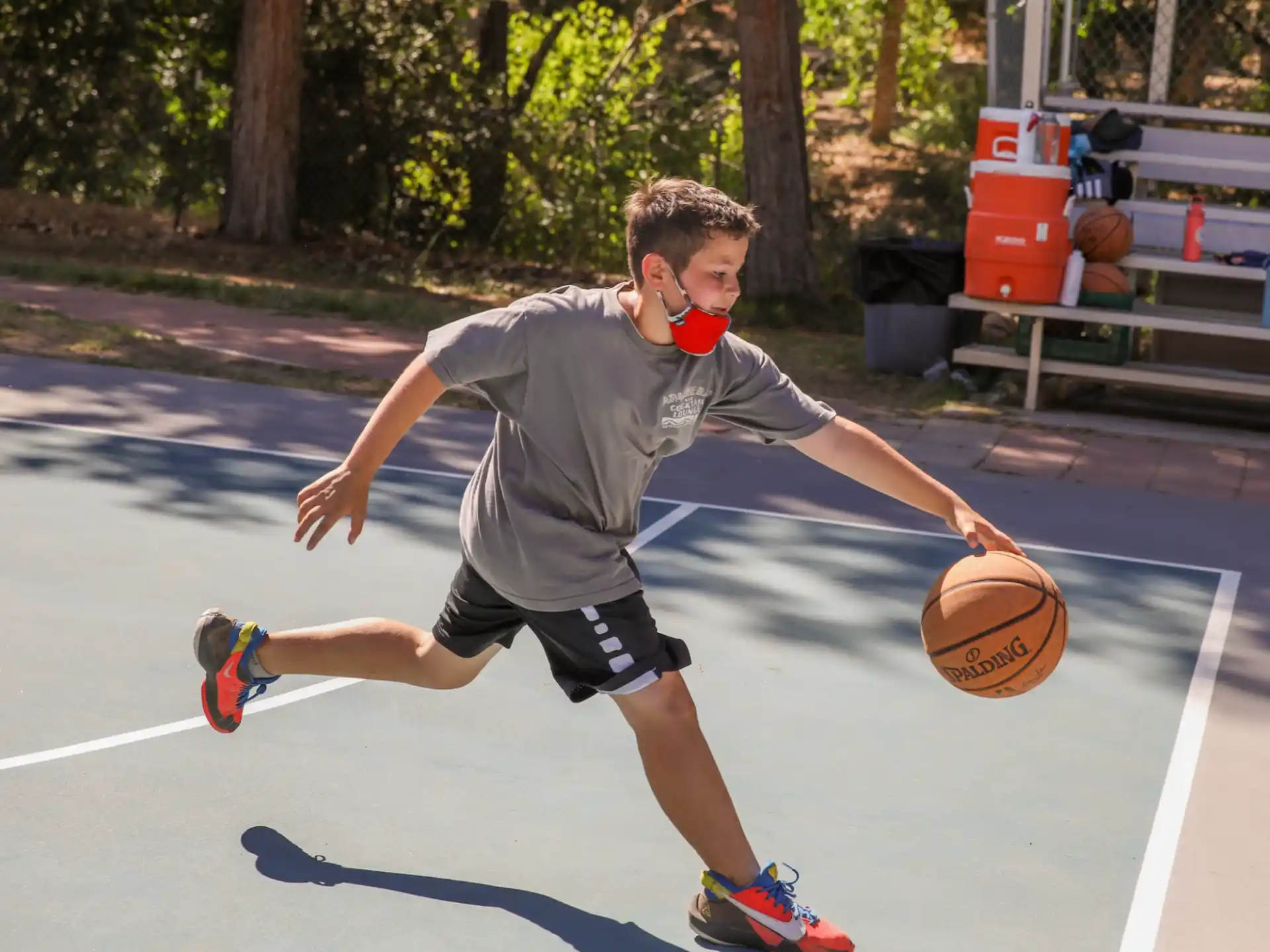 a boy playing basketball
