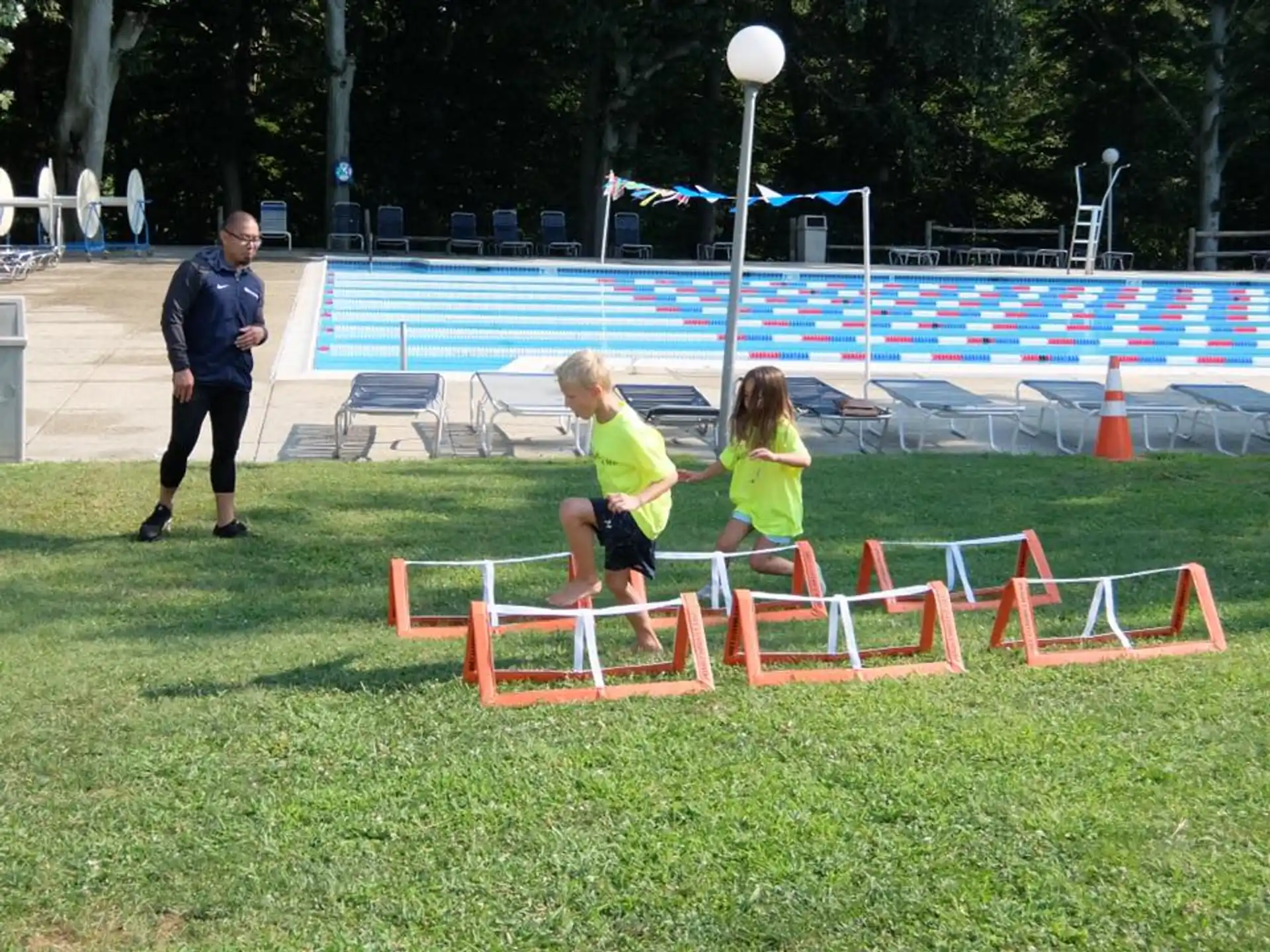 a group of kids playing football