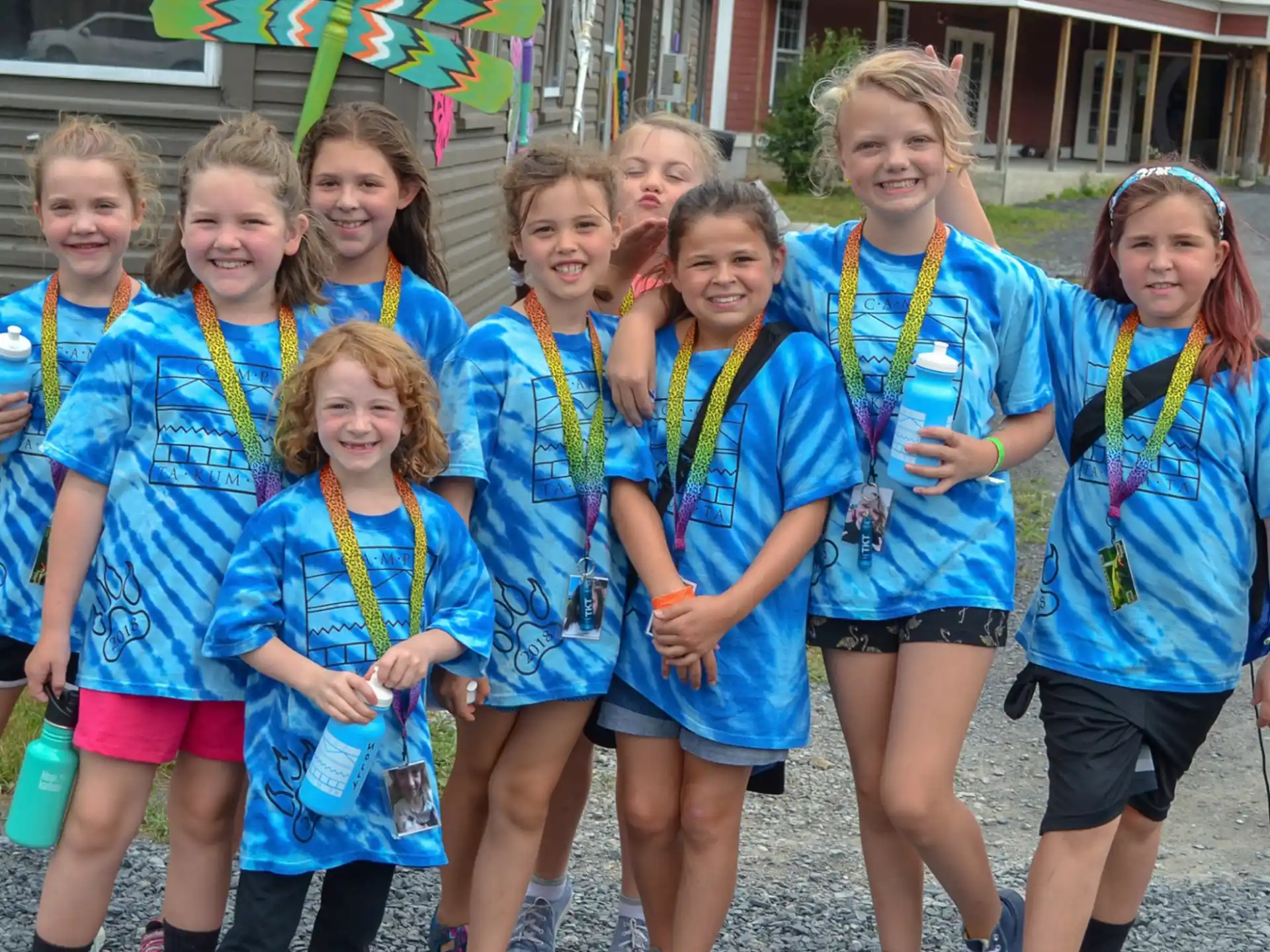 a group of girls wearing medals