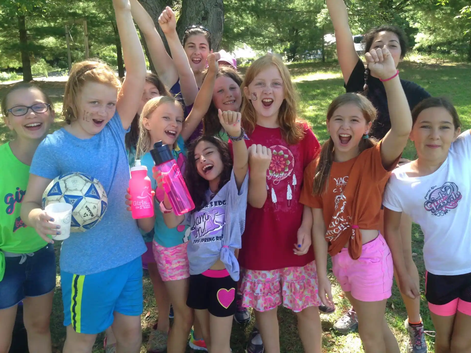 a group of girls posing for a photo