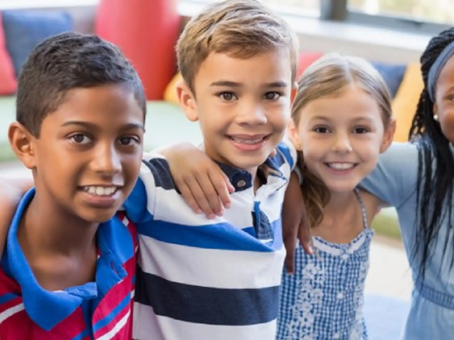 a group of children smiling
