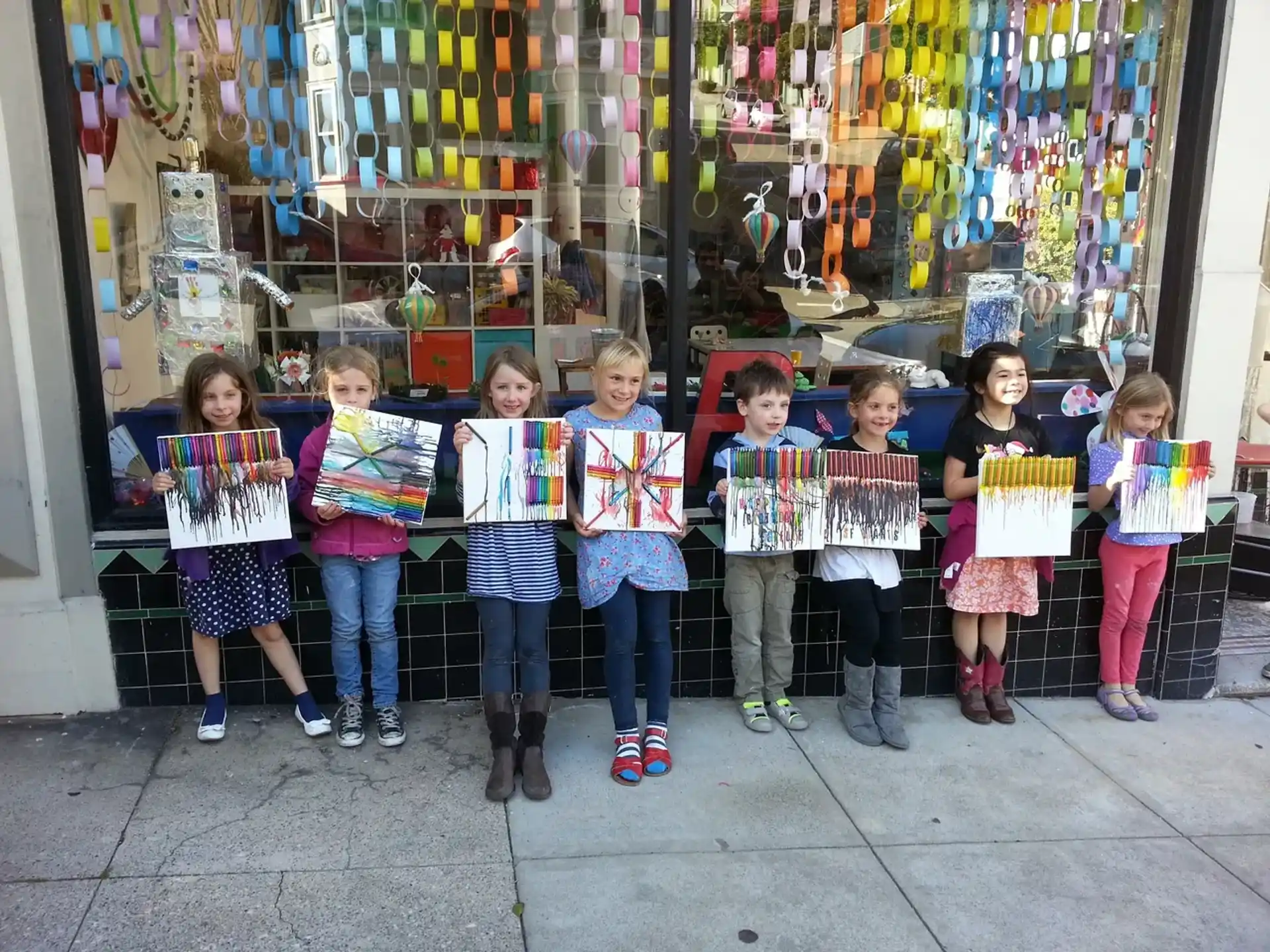 a group of children holding signs