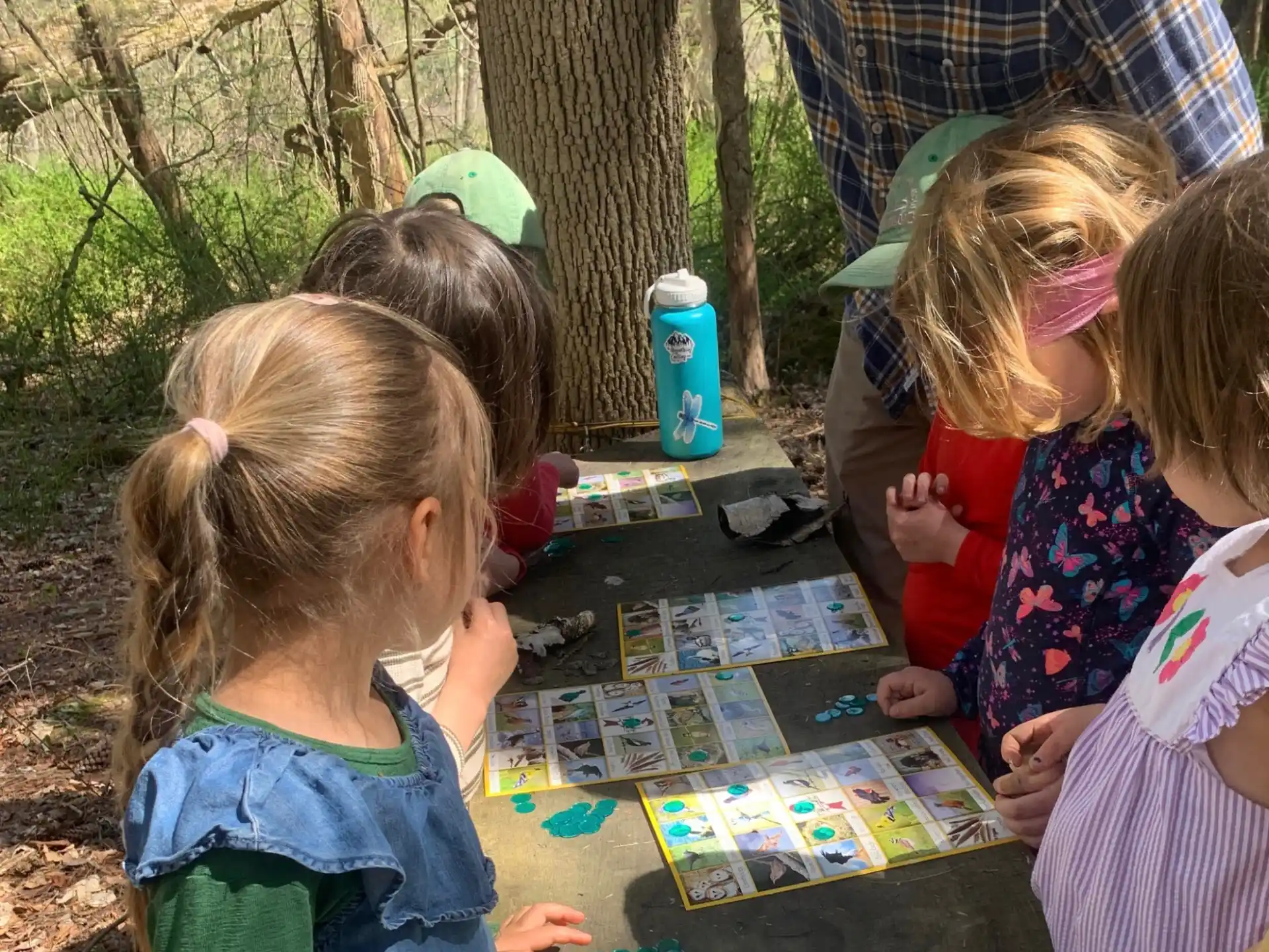 a group of children playing a board game
