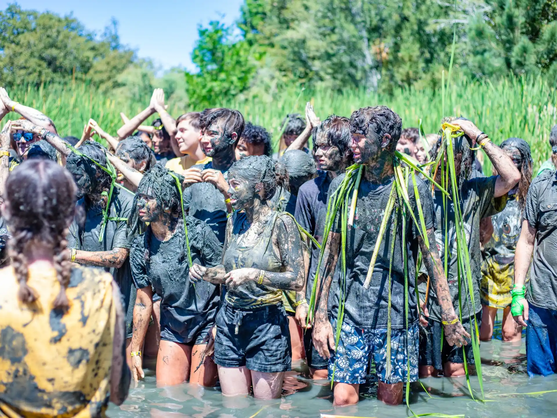 a group of people in raincoats