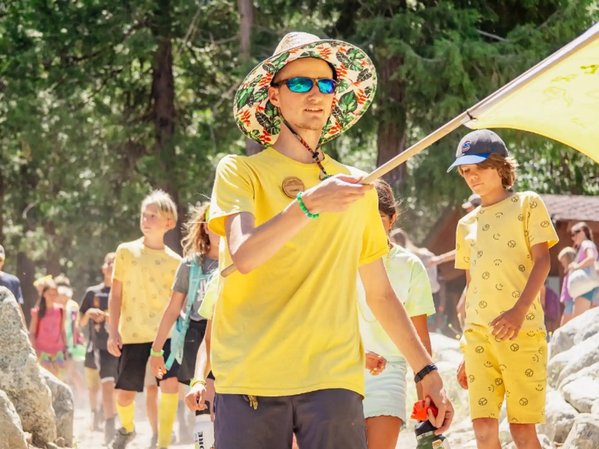 a man wearing a helmet and holding a yellow object