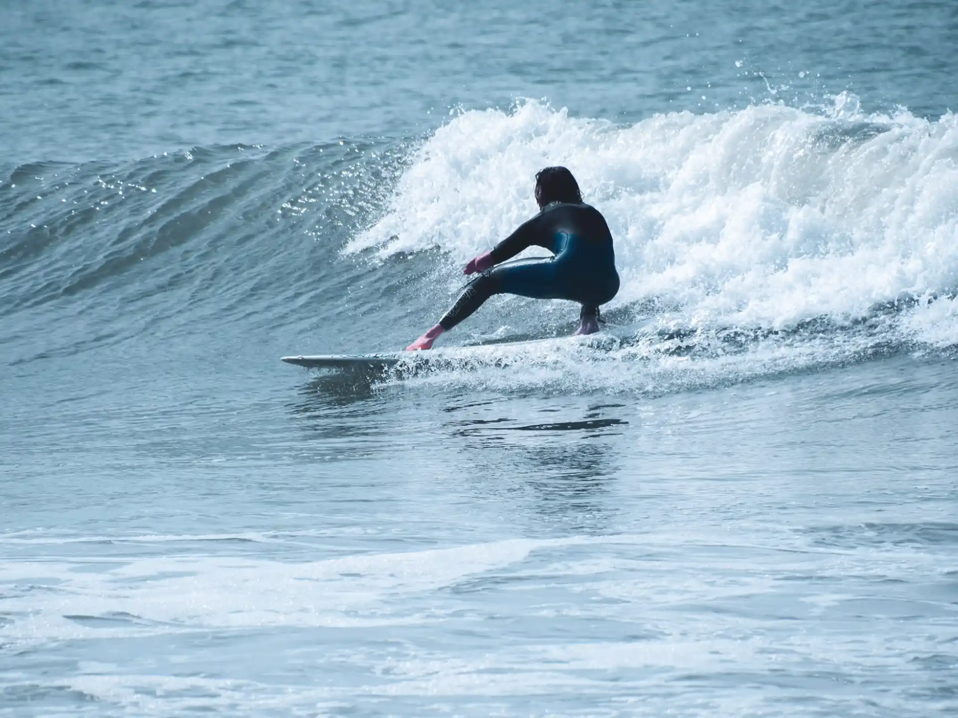 a surfer riding a wave