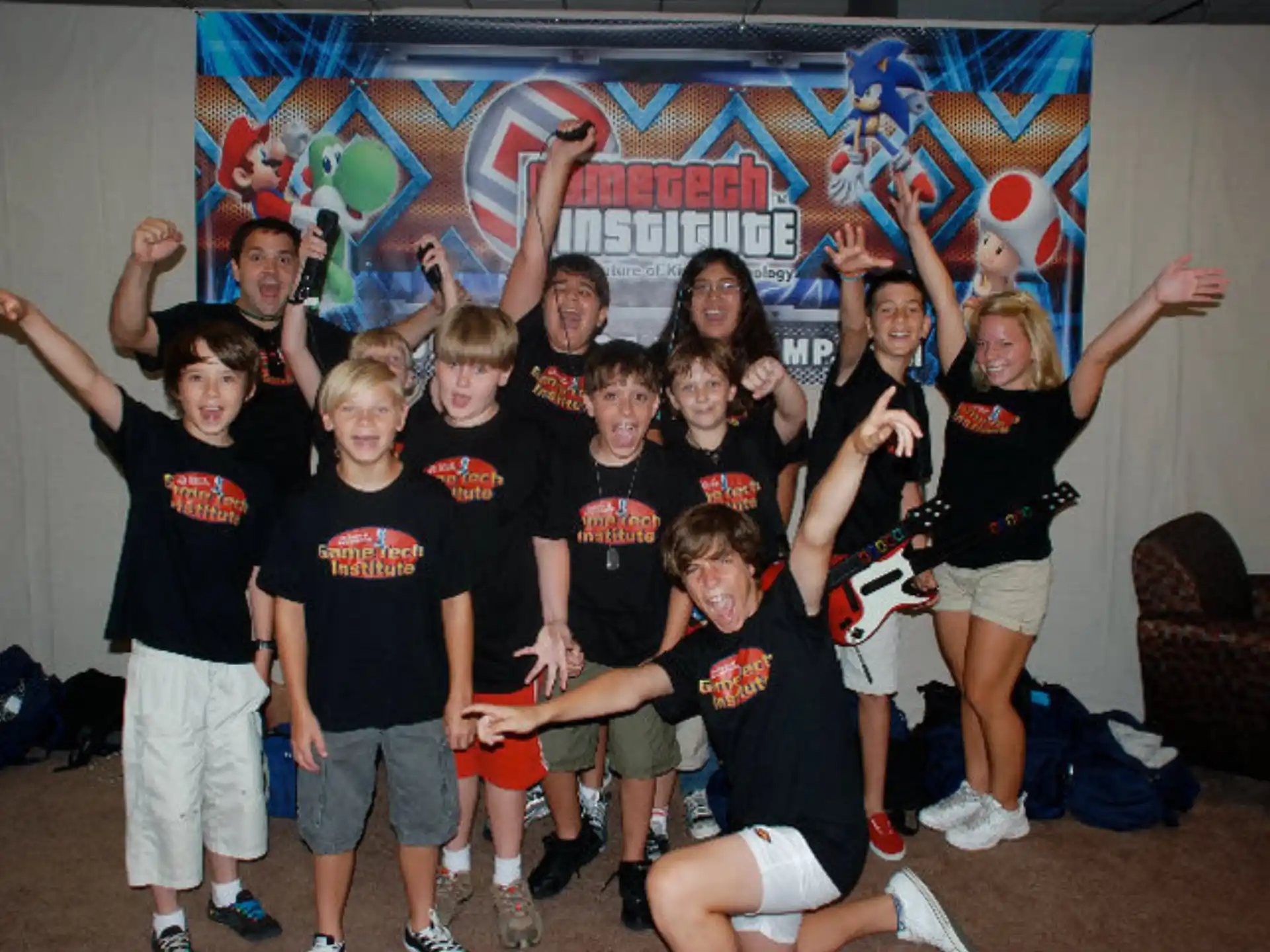 a group of kids posing for a photo
