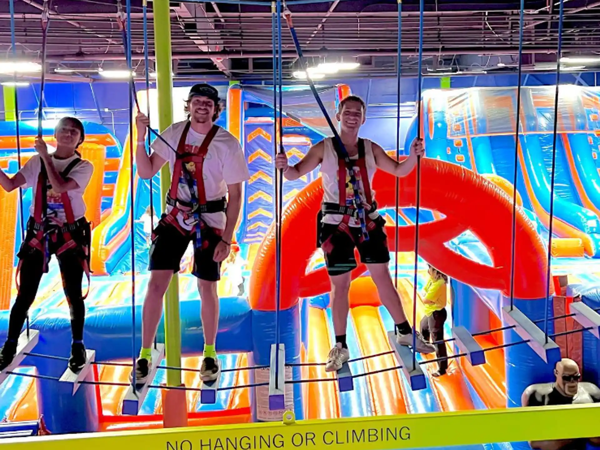 a group of men in a roller coaster