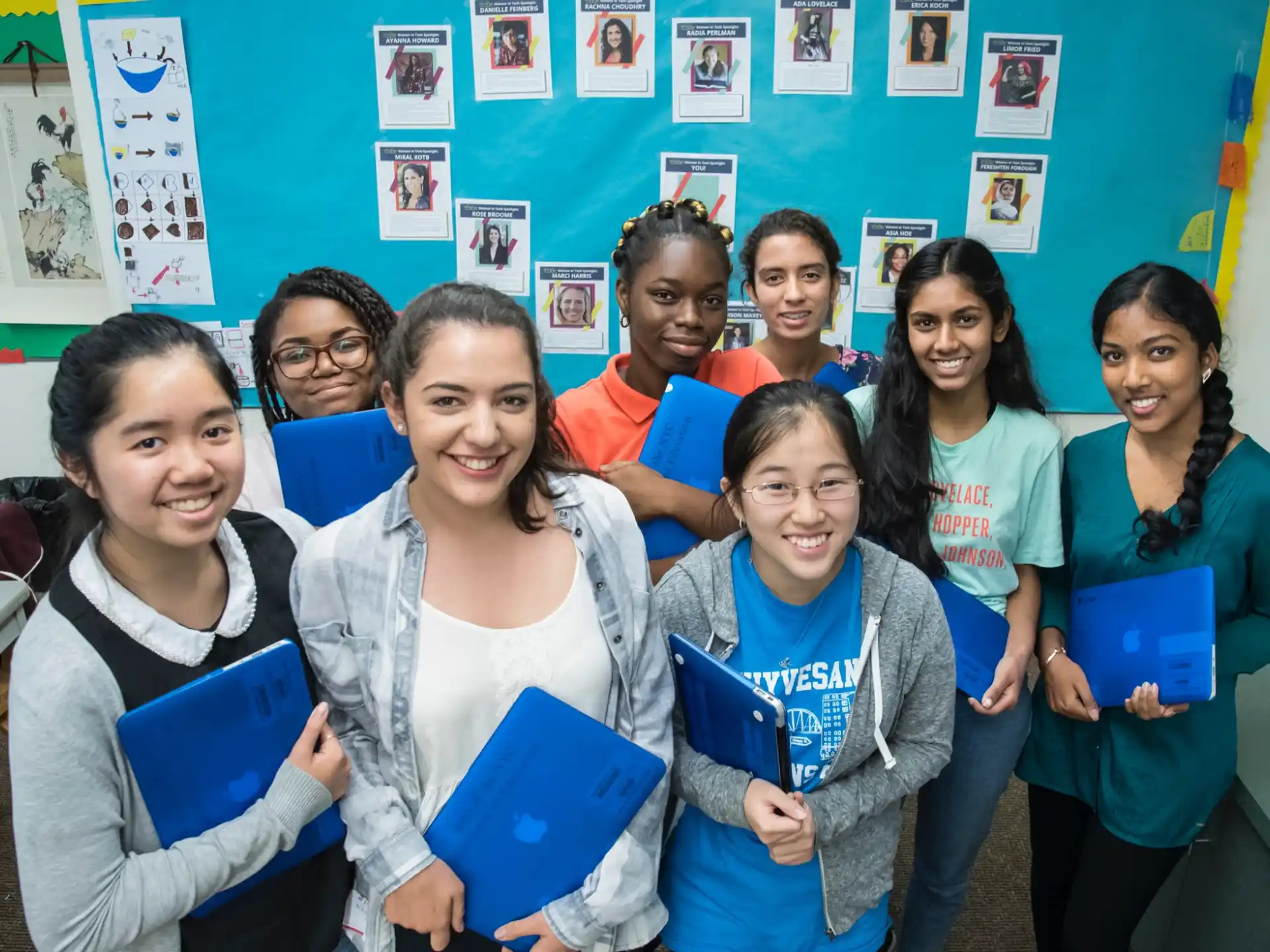 a group of girls posing for a photo