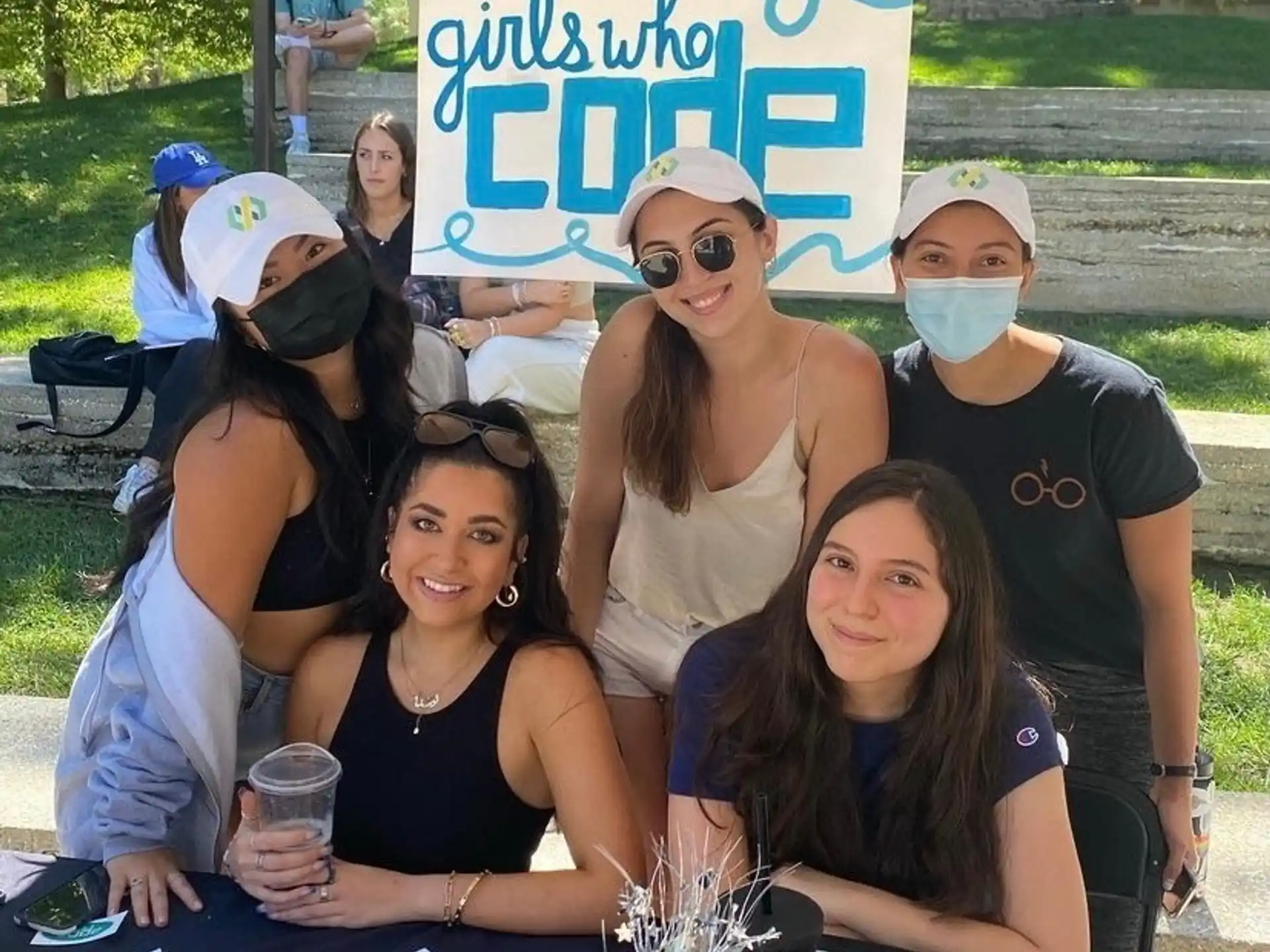 a group of people posing for a photo