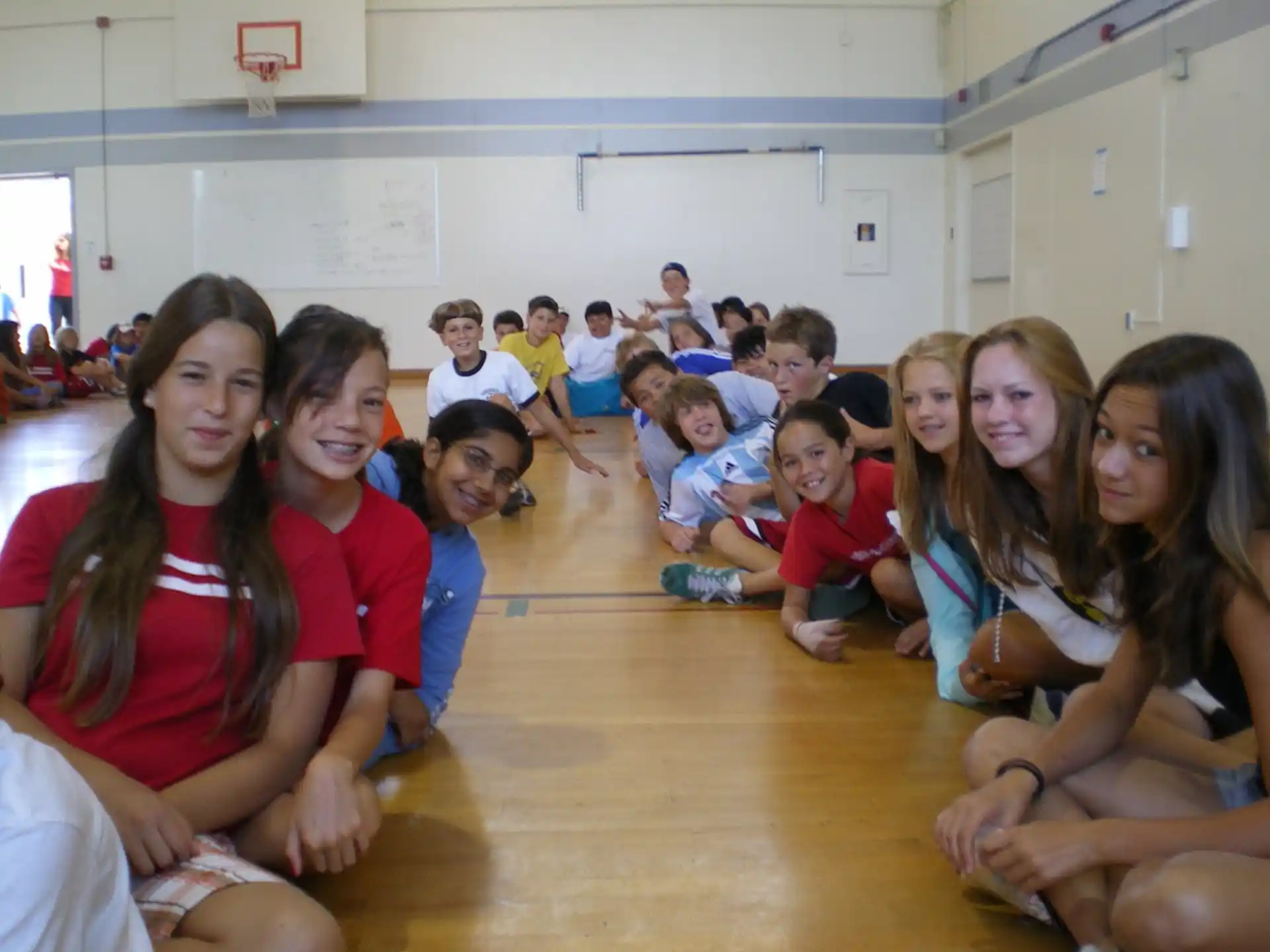 a group of people sitting on the floor