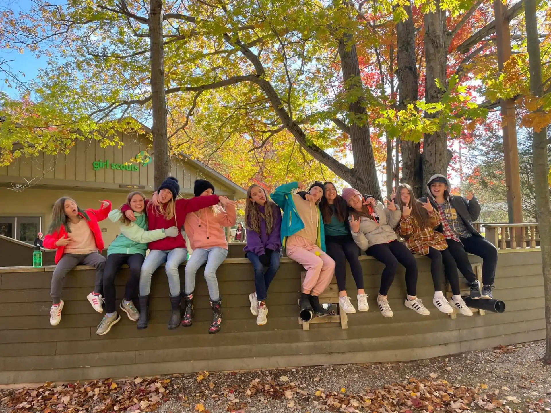 a group of people sitting on a bench