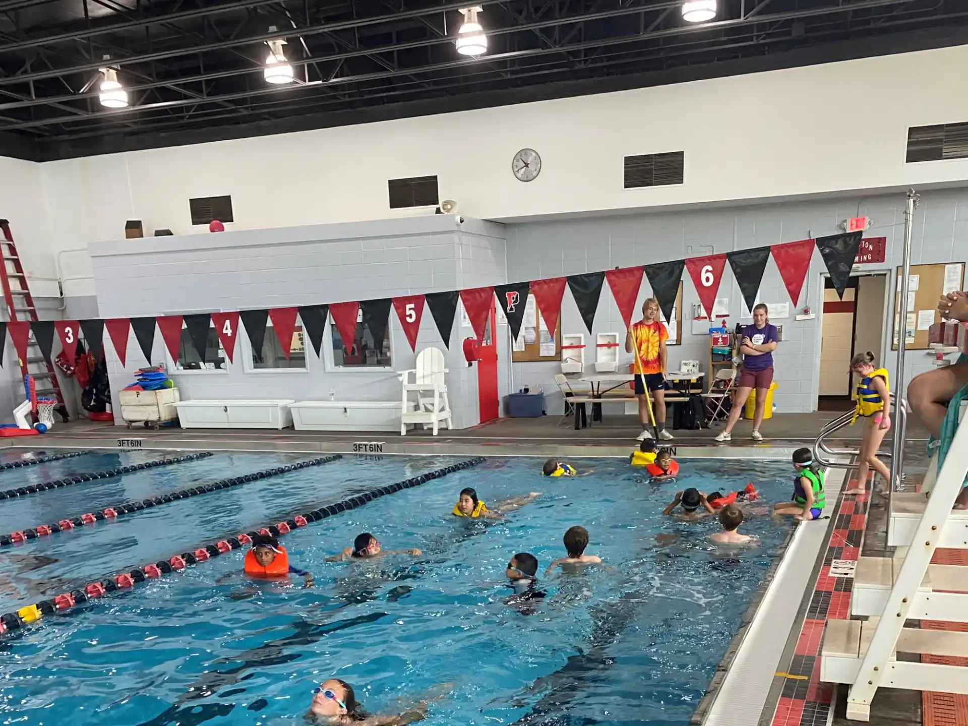 a group of people in a swimming pool